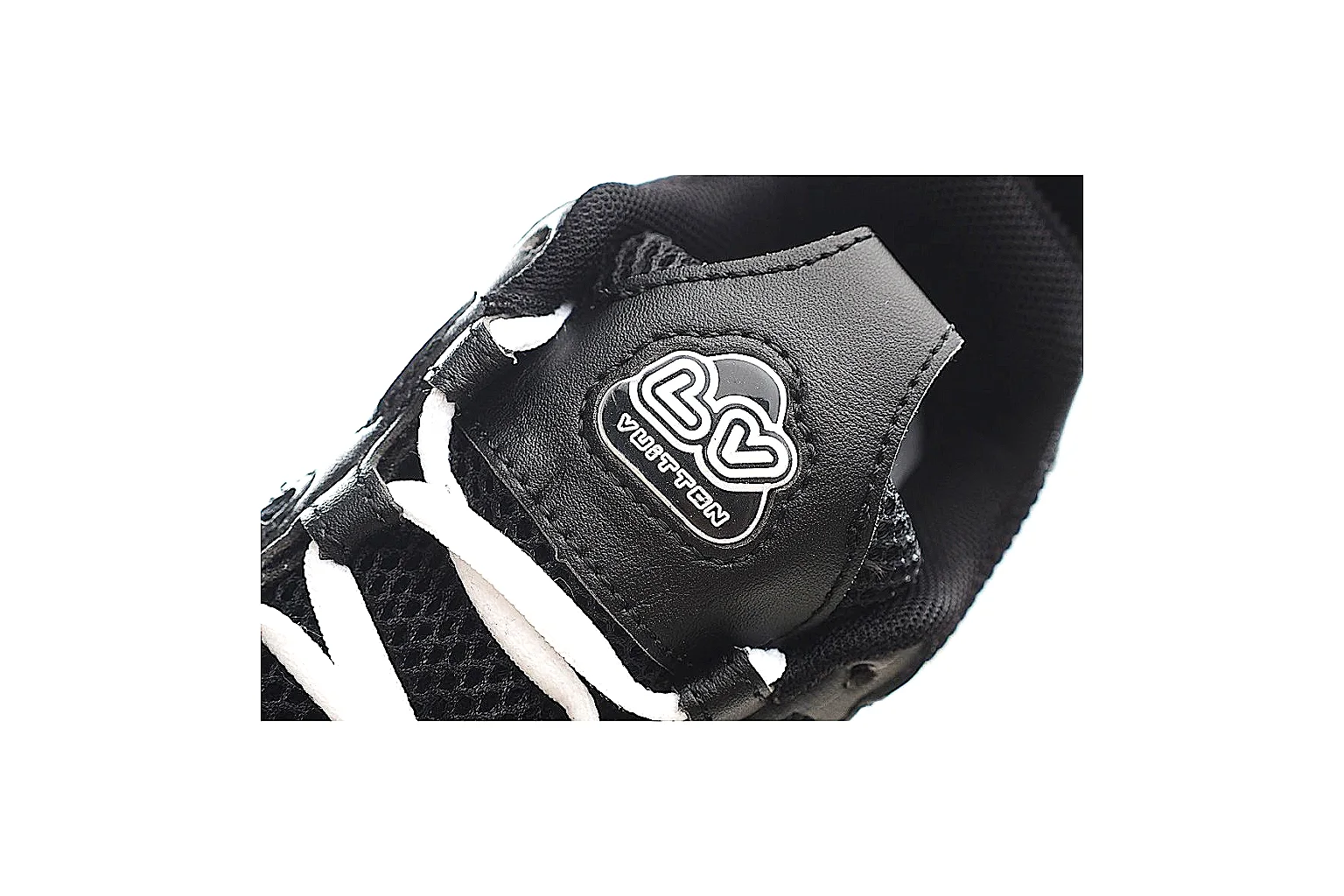 Louis Vuitton 0771 black trainer QC closeup for side badge and mesh checks thumbnail 3