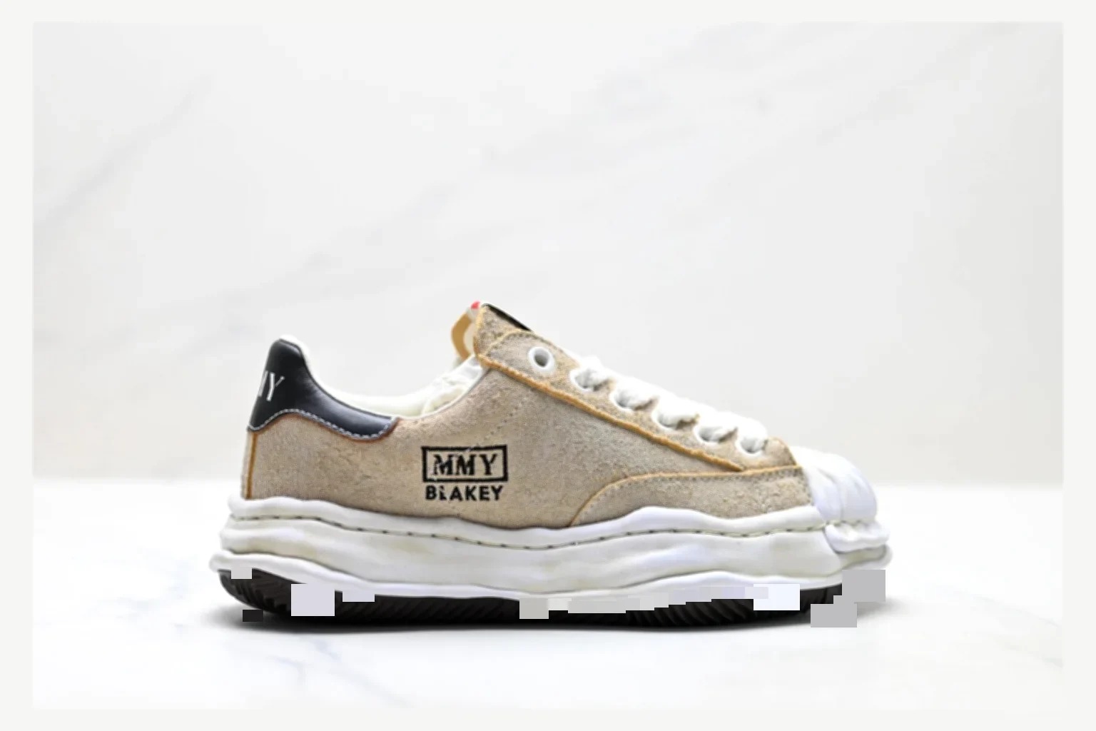 Maison Mihara Yasuhiro Blakey White Black Low Top QC photo reference SKU 1182167448