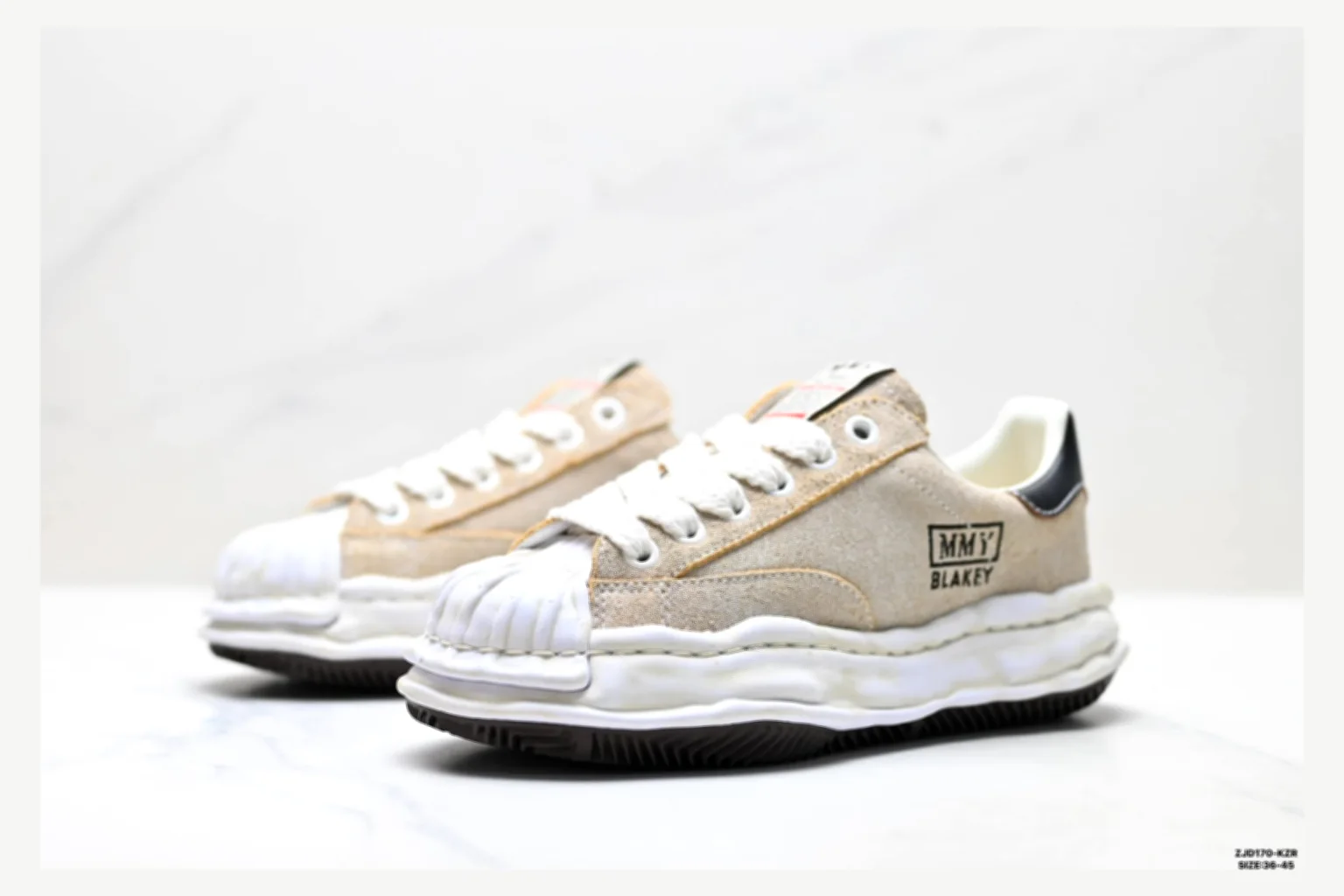 Maison Mihara Yasuhiro Blakey White Black Low Top QC photo reference SKU 1182167448