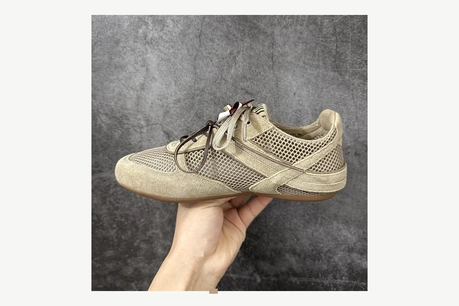 Miu Miu Beige Logo Sneaker QC photo showing beige logo low-top with mixed-material upper and low-profile shape