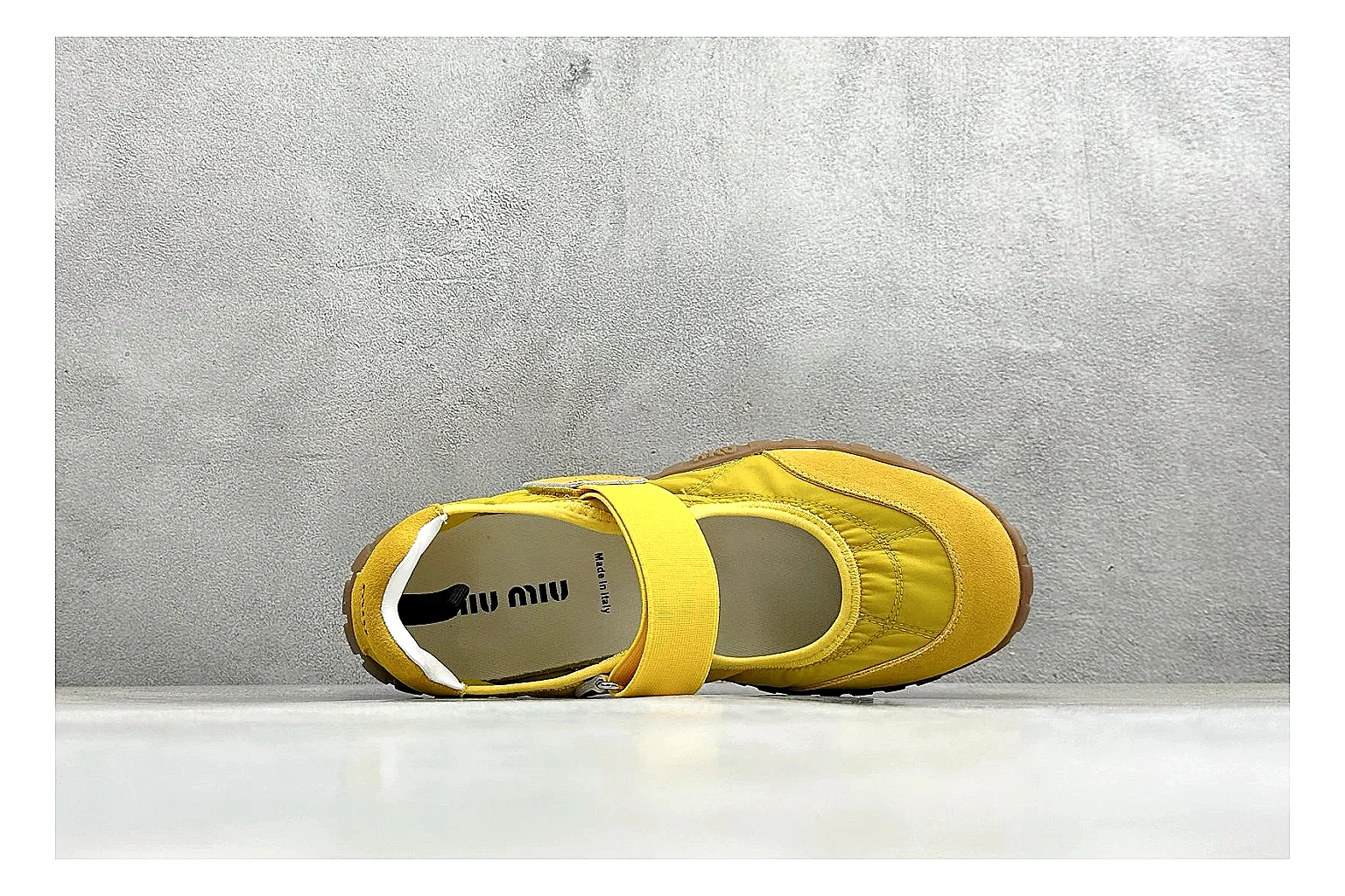Miu Miu Tyre Yellow Mary Jane QC reference photo showing yellow Mary Jane upper, strap closure, rugged Tyre outsole, and playful low-profile shape thumbnail 6