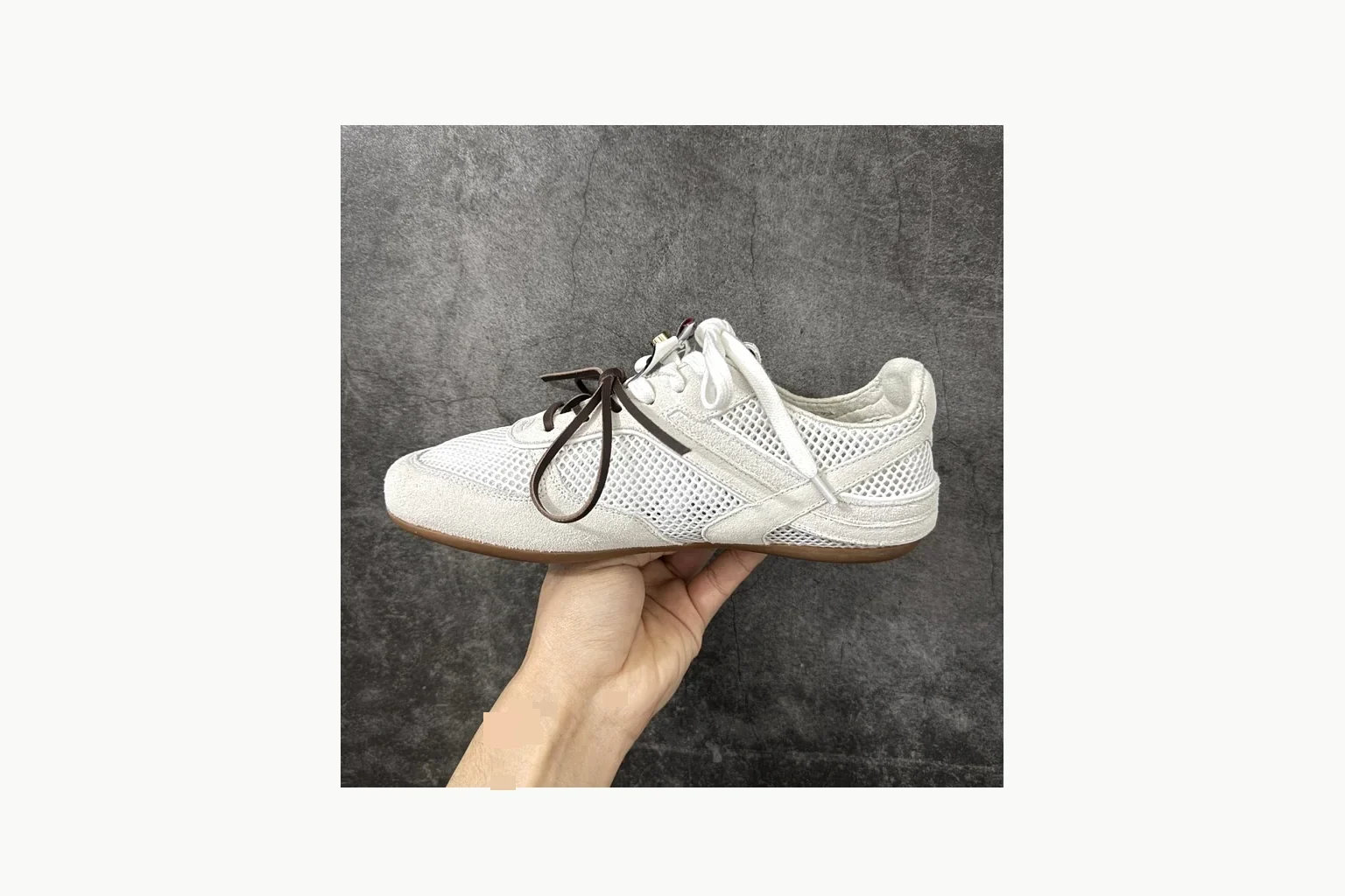 Miu Miu White Bow Sneaker QC photo showing white bow-detail low-top with mixed-material upper and low-profile shape