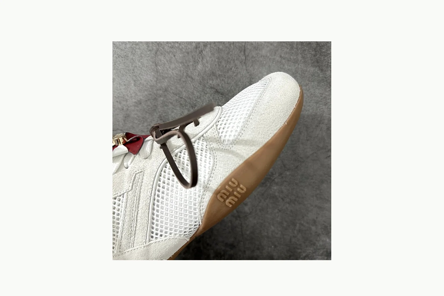 Miu Miu White Bow Sneaker QC photo showing white bow-detail low-top with mixed-material upper and low-profile shape thumbnail 4
