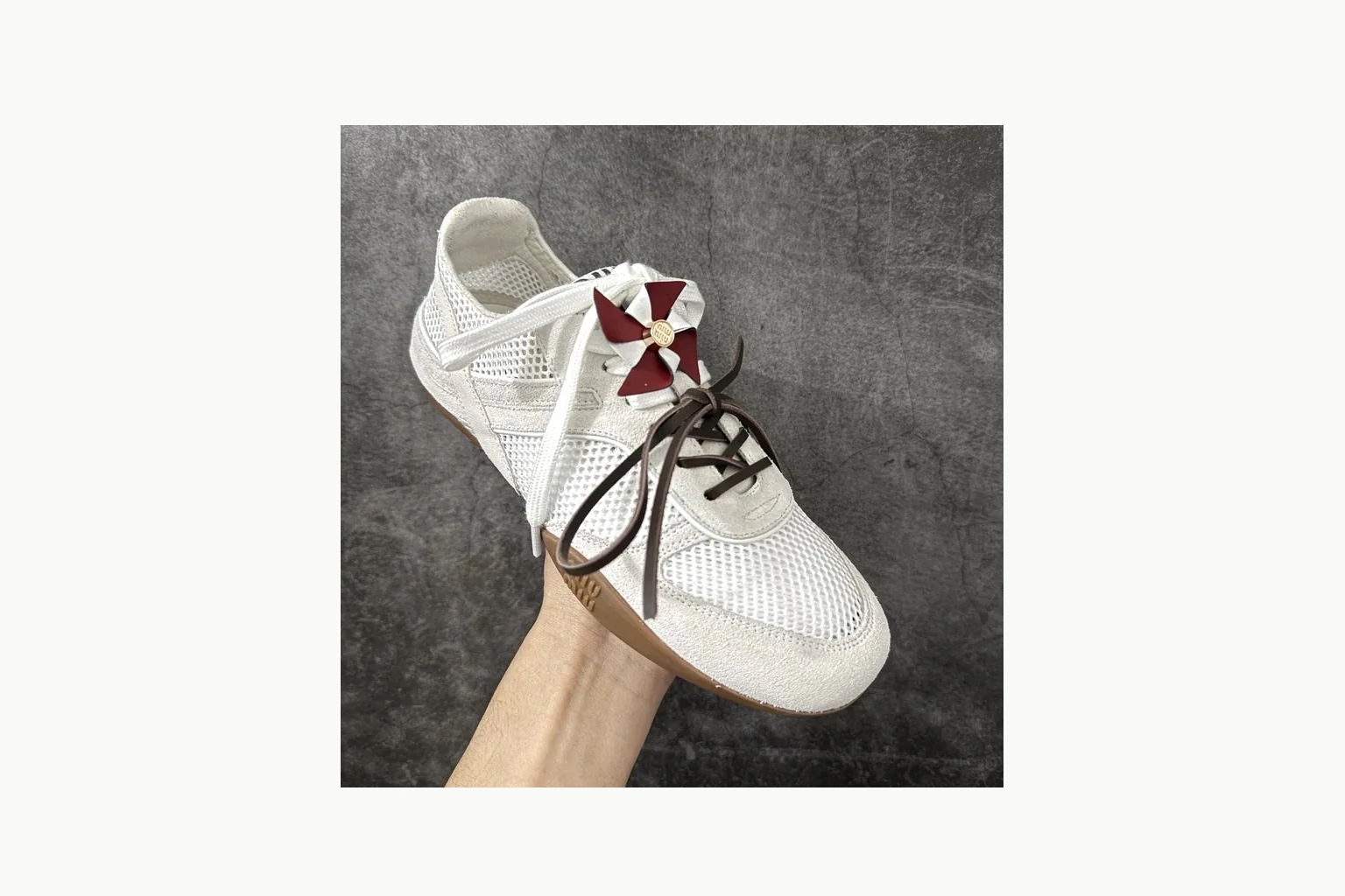 Miu Miu White Bow Sneaker QC photo showing white bow-detail low-top with mixed-material upper and low-profile shape thumbnail 6