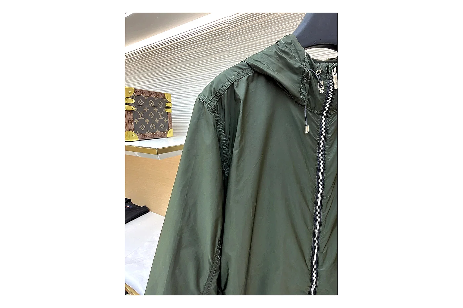 Moncler Nylon Hooded Jacket Olive Jacket QC photo reference showing olive nylon hooded jacket with nylon texture, hood structure, zipper line, sleeve cuffs, and light shell shape