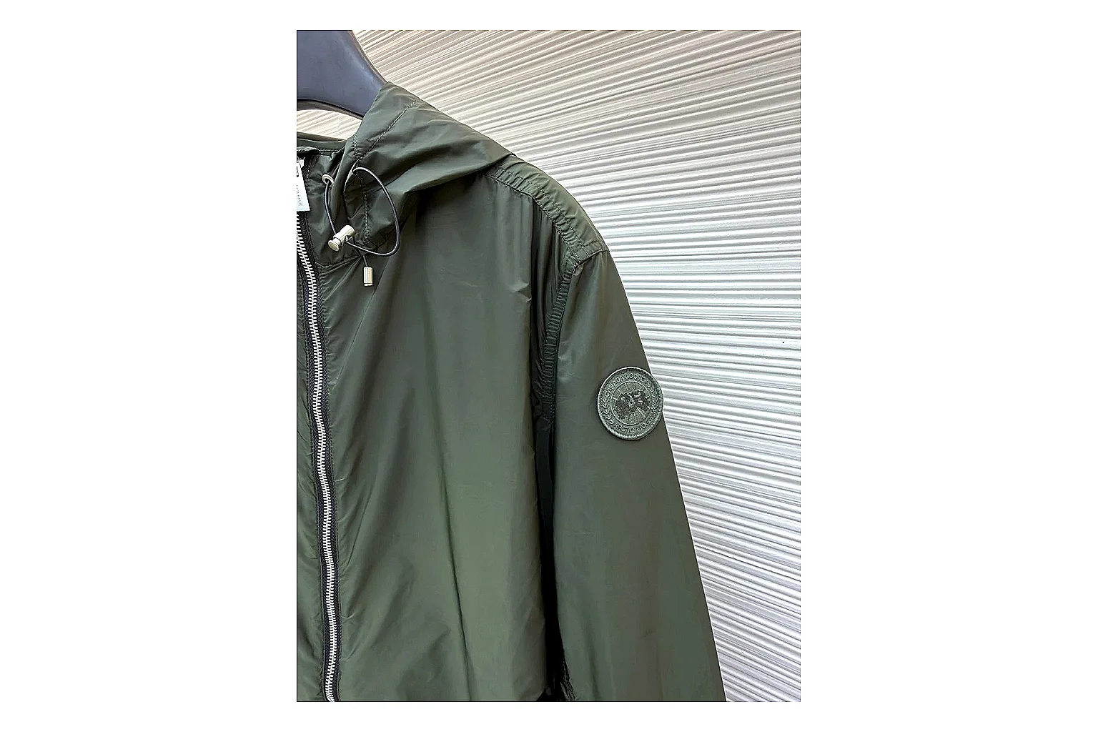 Moncler Nylon Hooded Jacket Olive Jacket QC photo reference showing olive nylon hooded jacket with nylon texture, hood structure, zipper line, sleeve cuffs, and light shell shape thumbnail 4