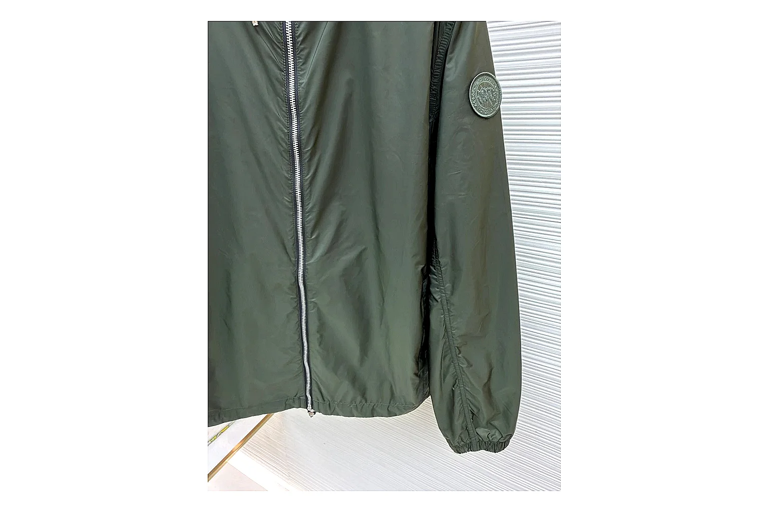 Moncler Nylon Hooded Jacket Olive Jacket QC photo reference showing olive nylon hooded jacket with nylon texture, hood structure, zipper line, sleeve cuffs, and light shell shape thumbnail 6