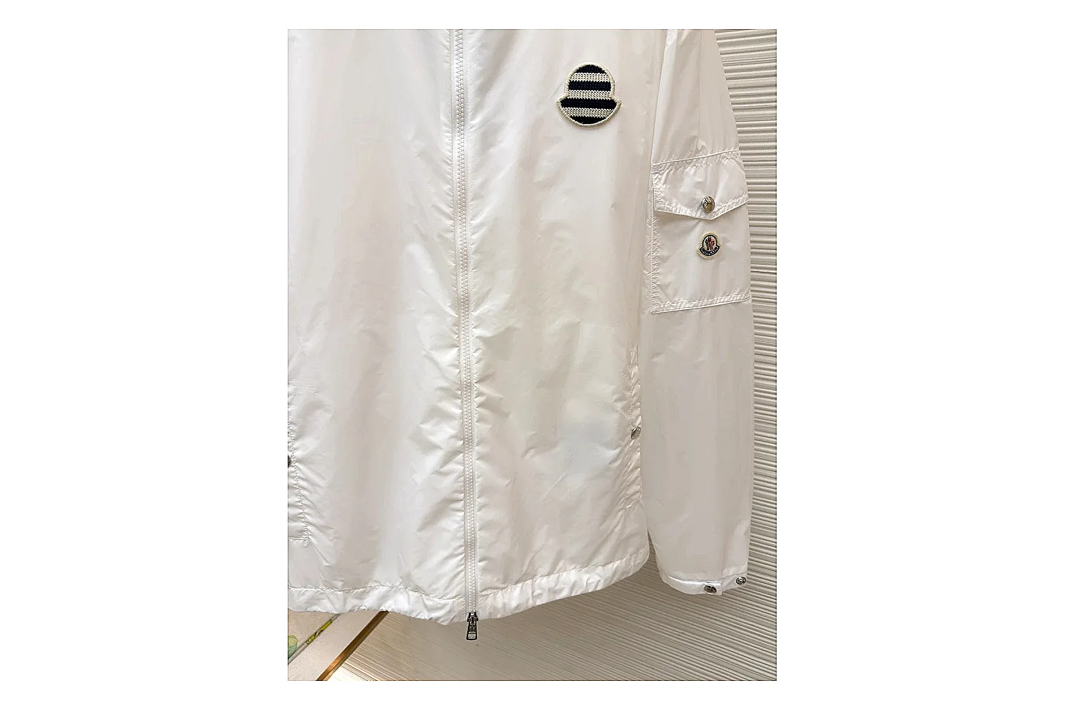 Moncler Nylon Hooded Jacket White Jacket QC photo reference showing white nylon hooded jacket with nylon texture, hood structure, zipper line, sleeve cuffs, and light shell shape thumbnail 6