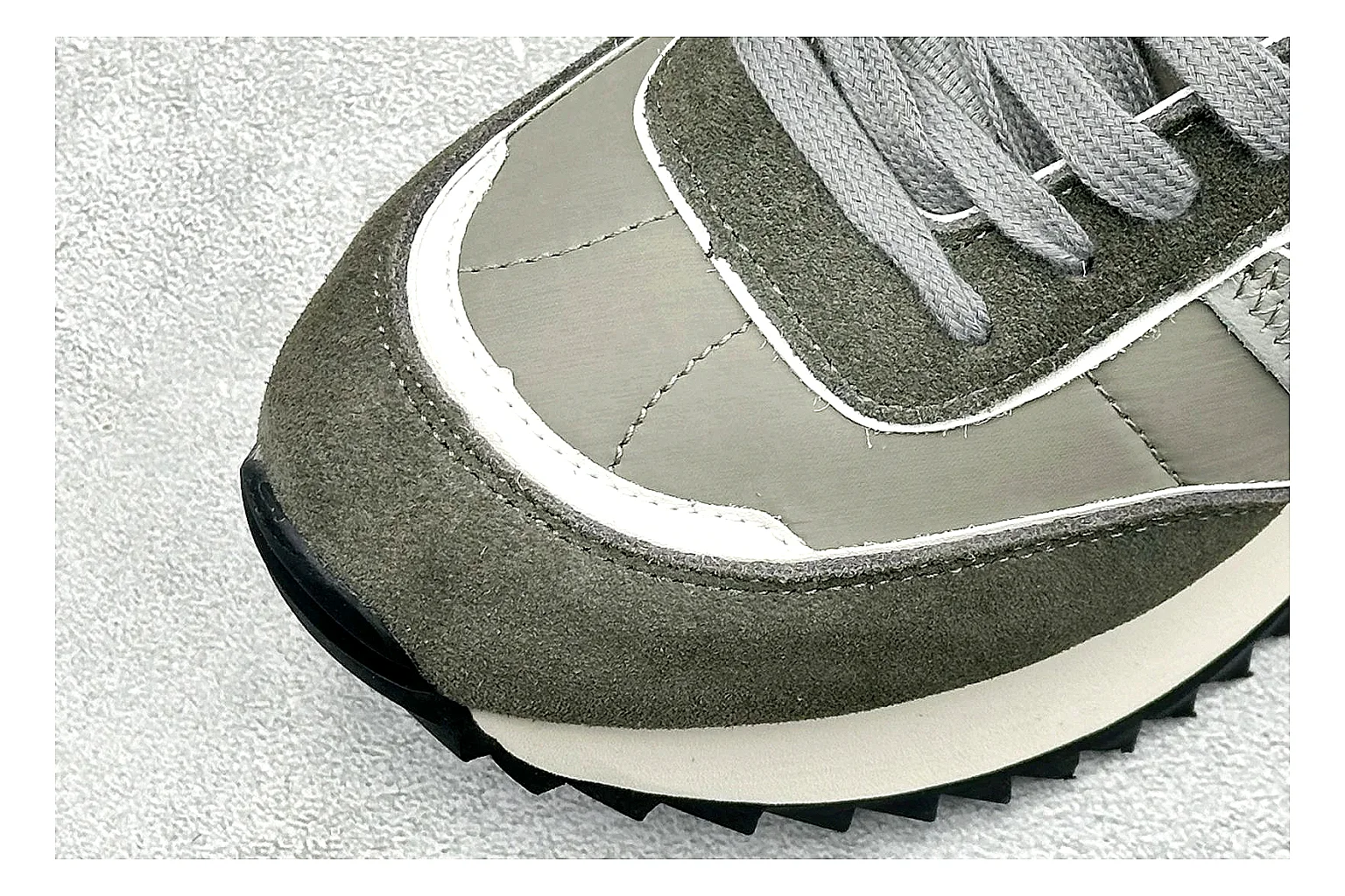 Moncler Pacey Grey Suede QC reference image showing grey suede upper, rugged white outsole, low collar, and soft neutral streetwear tone thumbnail 4