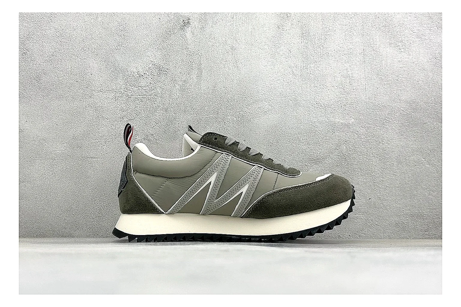 Moncler Pacey Grey Suede QC reference image showing grey suede upper, rugged white outsole, low collar, and soft neutral streetwear tone thumbnail 5
