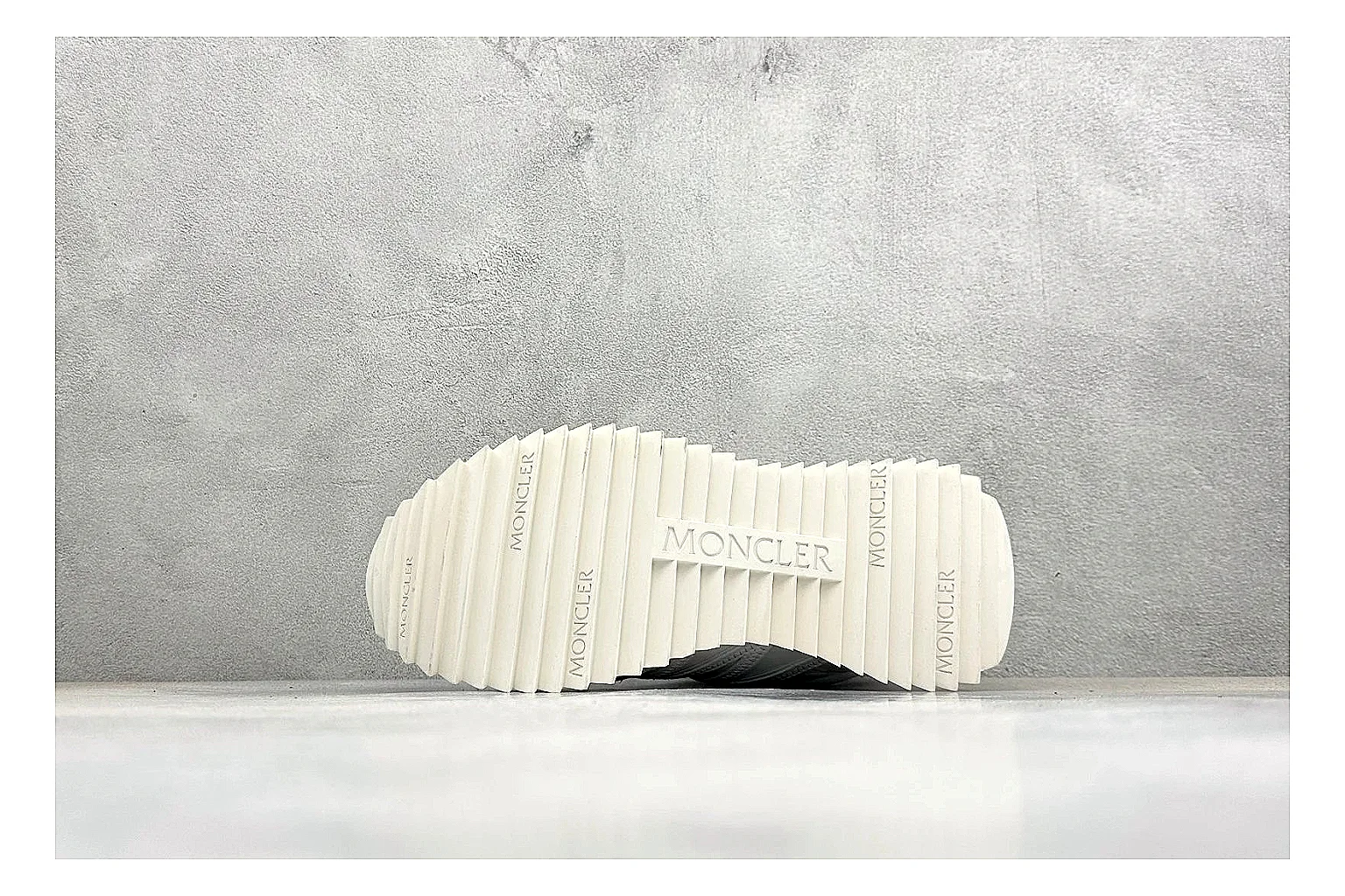 Moncler Pacey White Suede QC reference image showing light suede upper, chunky serrated outsole, low padded collar, and tonal casual build thumbnail 3