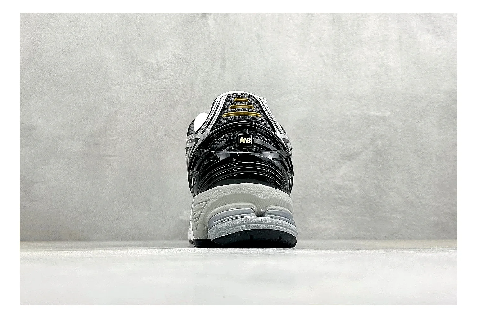 New Balance 1906 Black Silver QC reference photo showing black mesh base, silver overlays, technical 1906 runner structure, and layered performance sole thumbnail 2