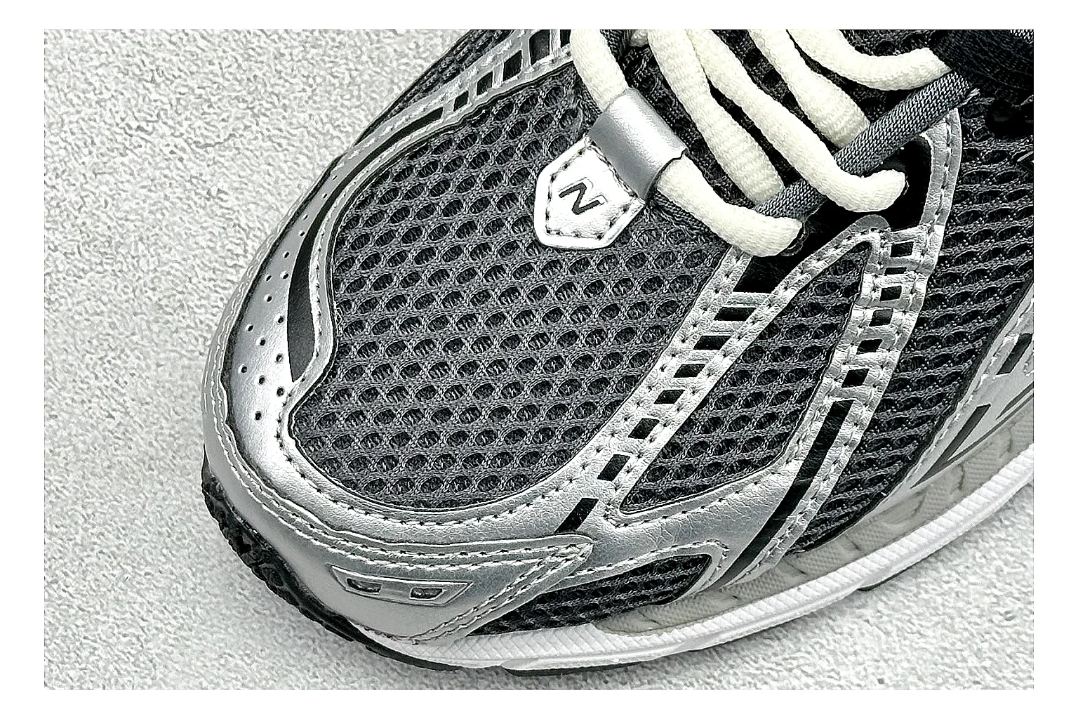 New Balance 1906 Black Silver QC reference photo showing black mesh base, silver overlays, technical 1906 runner structure, and layered performance sole thumbnail 4