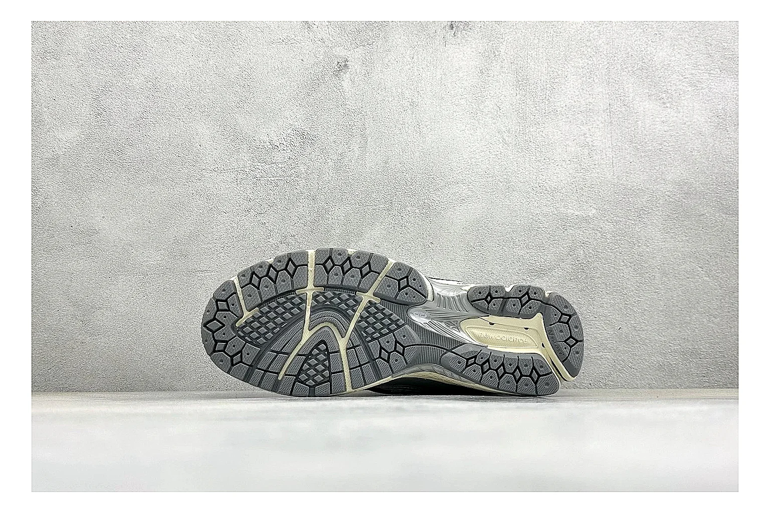 New Balance 1906 Silver Grey QC reference image showing silver overlays, grey mesh panels, technical runner structure, and layered midsole tooling thumbnail 3