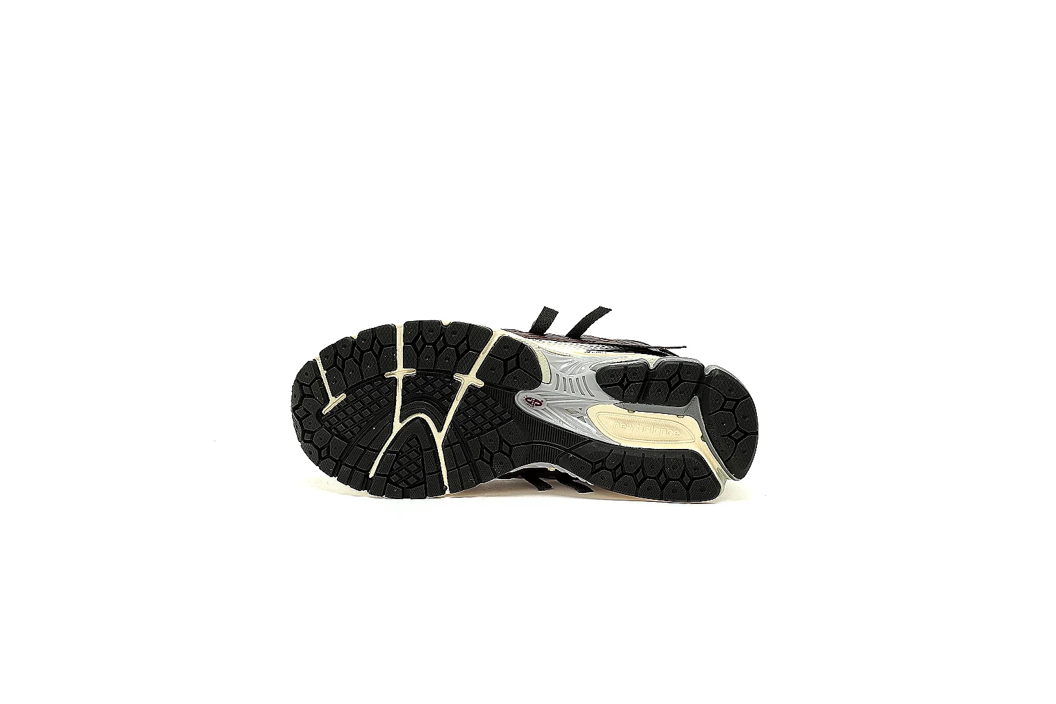 New Balance 1906A lateral QC view showing mesh overlays N logo and segmented midsole thumbnail 3