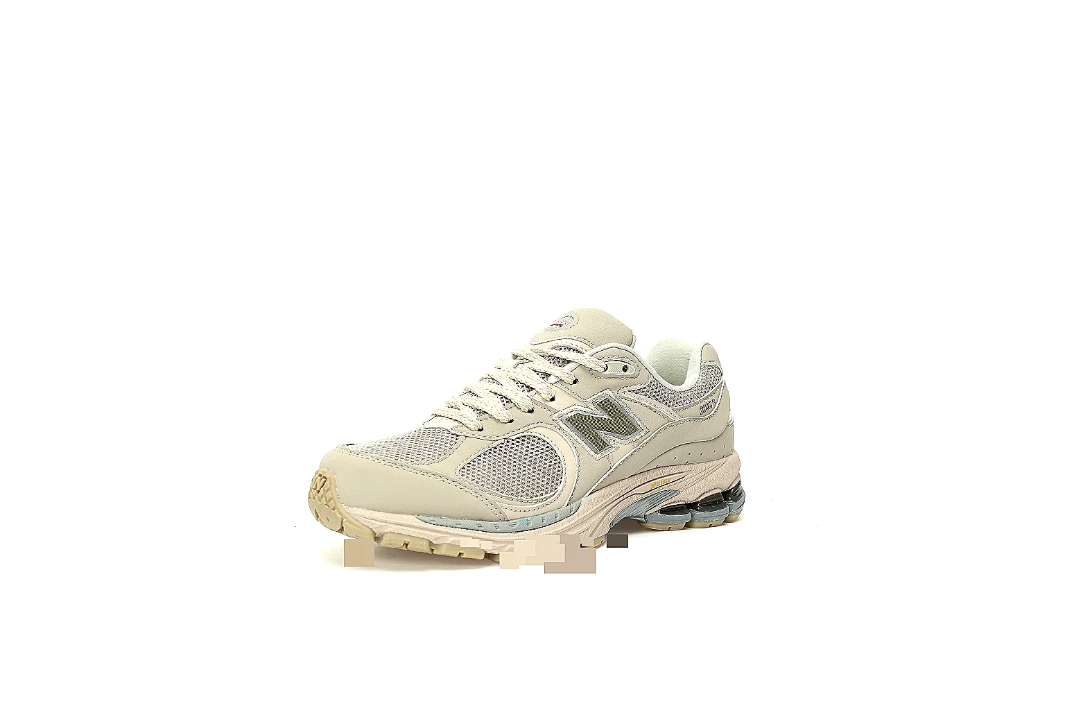 New Balance 2002R cream QC gallery showing logos, mesh, overlays, heel units and outsole thumbnail 2