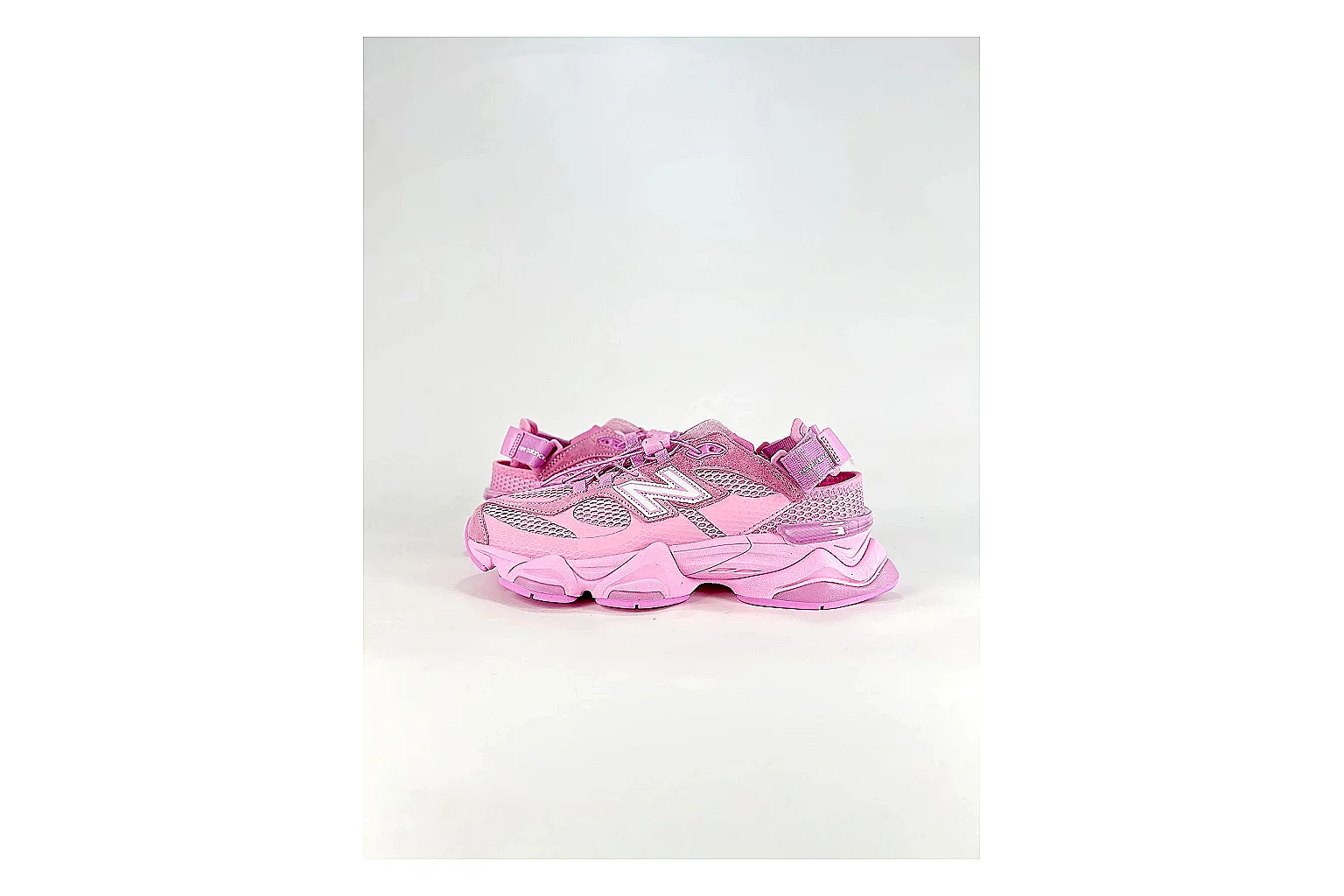 New Balance 9060 Pink Sneakers QC photo reference showing pink chunky runner sneakers with mesh-leather texture, side-profile shape, upper panel lines, and outsole detail