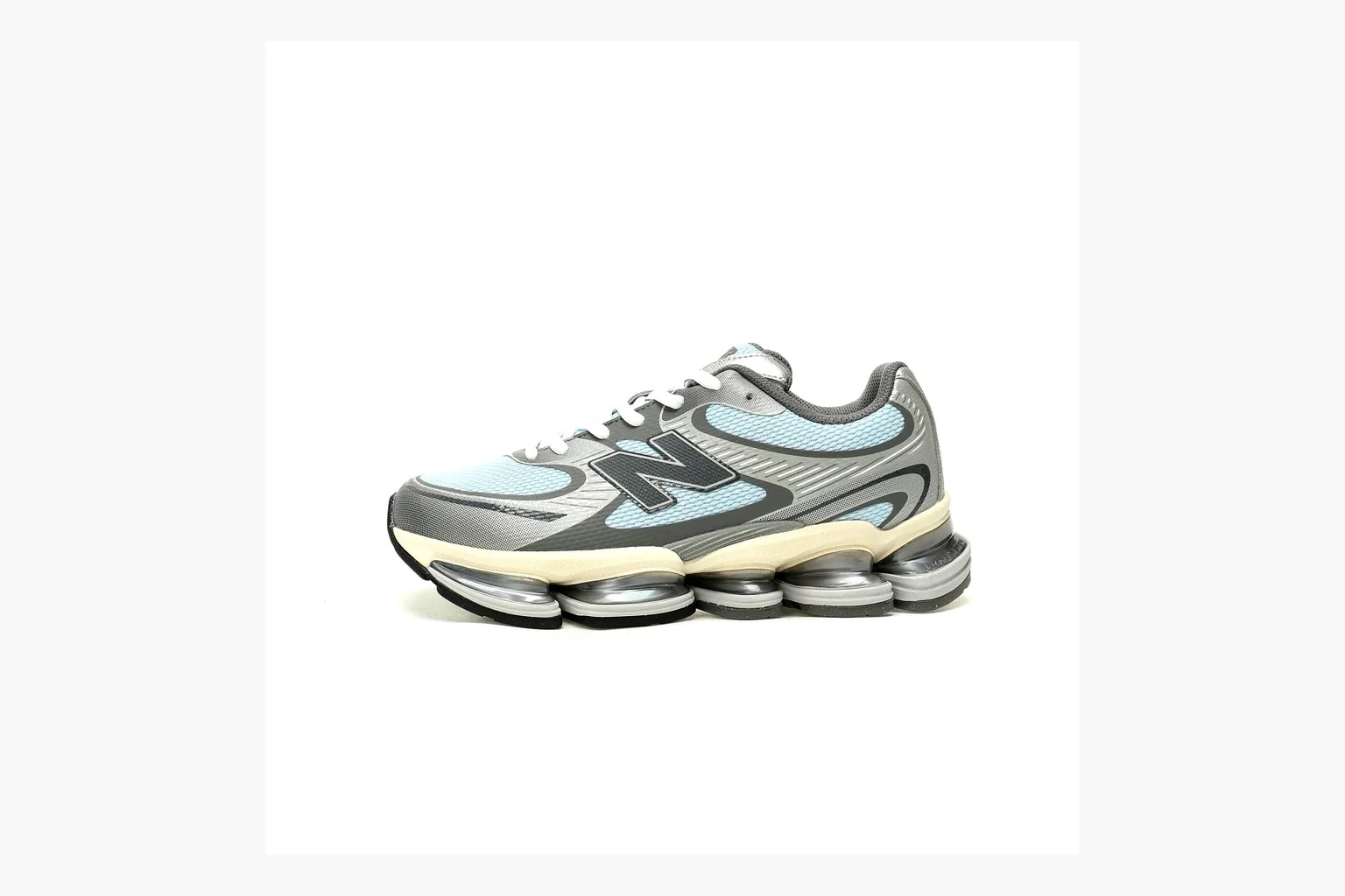 New Balance 9060 Runner Sneaker Silver Teal QC photo showing silver and teal NB 9060 runner with chunky sole, mesh panels, and side N logo