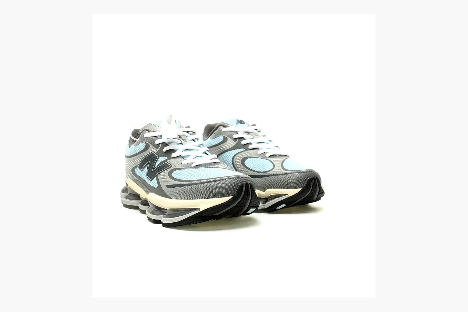 New Balance 9060 Runner Sneaker Silver Teal QC photo showing silver and teal NB 9060 runner with chunky sole, mesh panels, and side N logo thumbnail 3