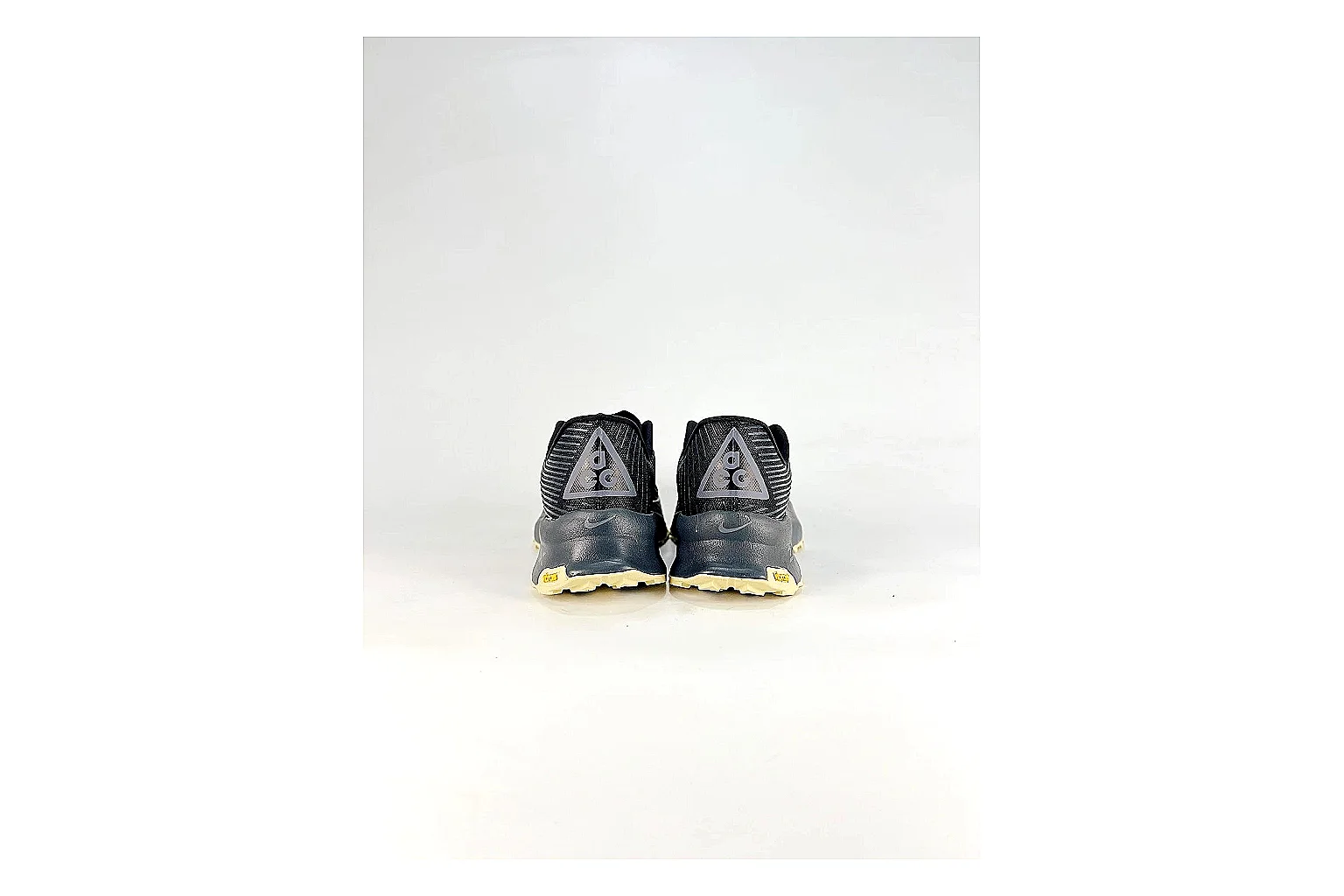 Nike ACG Ultra Black Gum Sneakers QC photo reference showing black gum outdoor sneakers with textile texture, side-profile shape, upper panel lines, and outsole detail