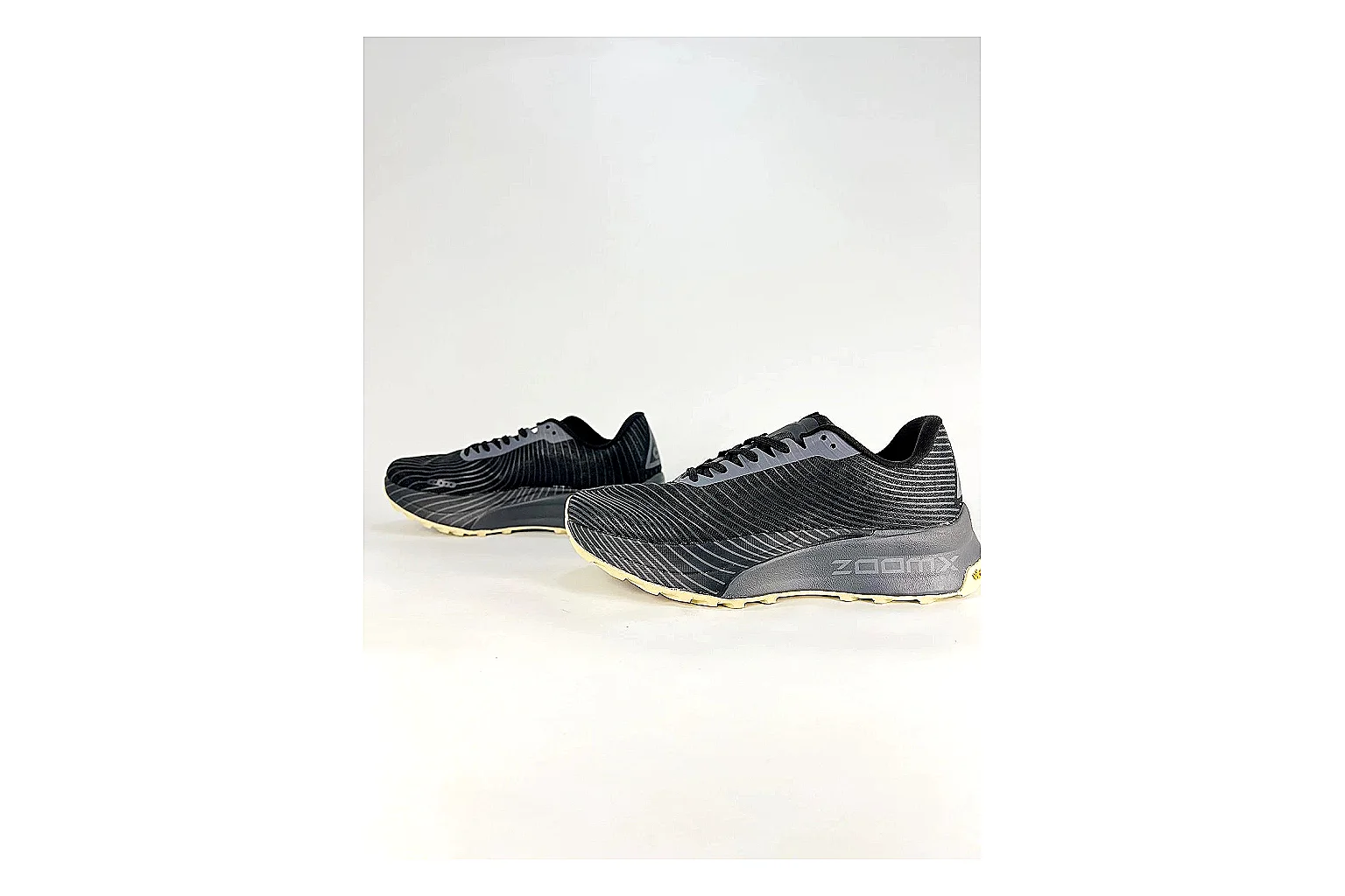 Nike ACG Ultra Black Gum Sneakers QC photo reference showing black gum outdoor sneakers with textile texture, side-profile shape, upper panel lines, and outsole detail thumbnail 4