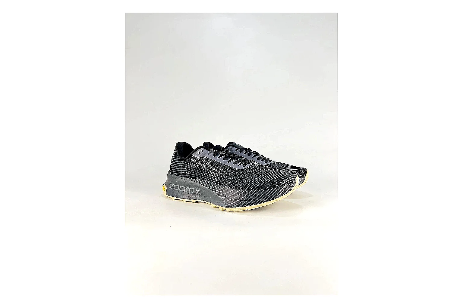 Nike ACG Ultra Black Gum Sneakers QC photo reference showing black gum outdoor sneakers with textile texture, side-profile shape, upper panel lines, and outsole detail thumbnail 5