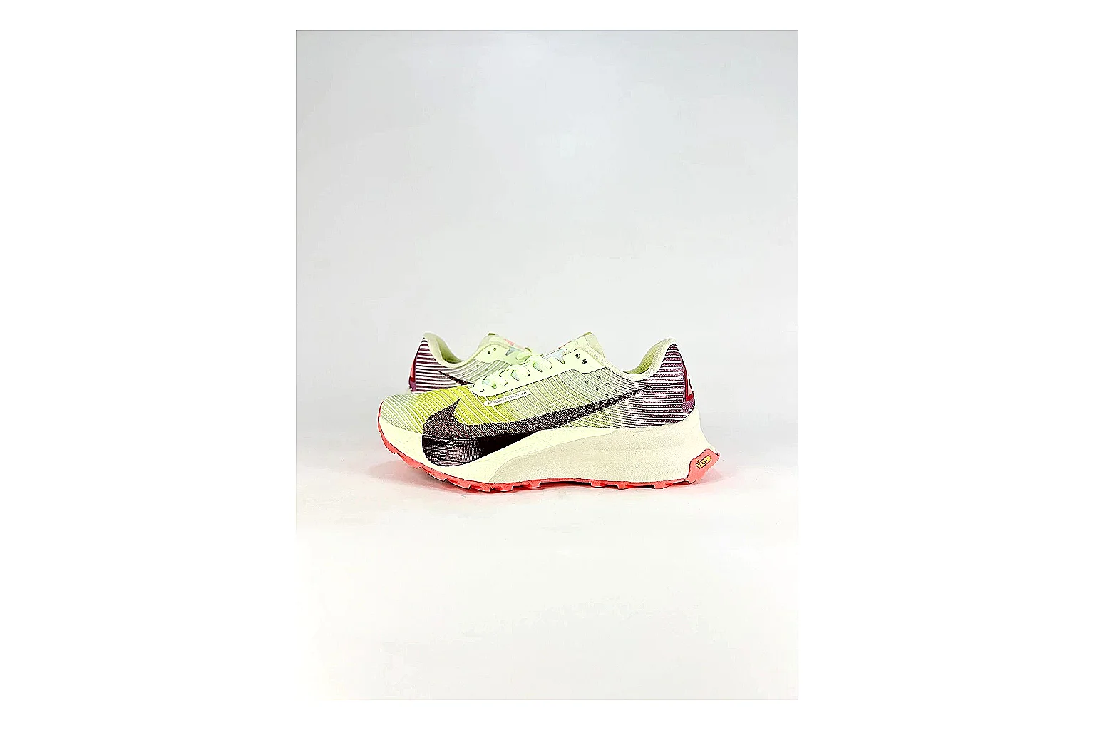 Nike ACG Ultra Lime Pink Sneakers QC photo reference showing lime pink outdoor sneakers with textile texture, side-profile shape, upper panel lines, and outsole detail