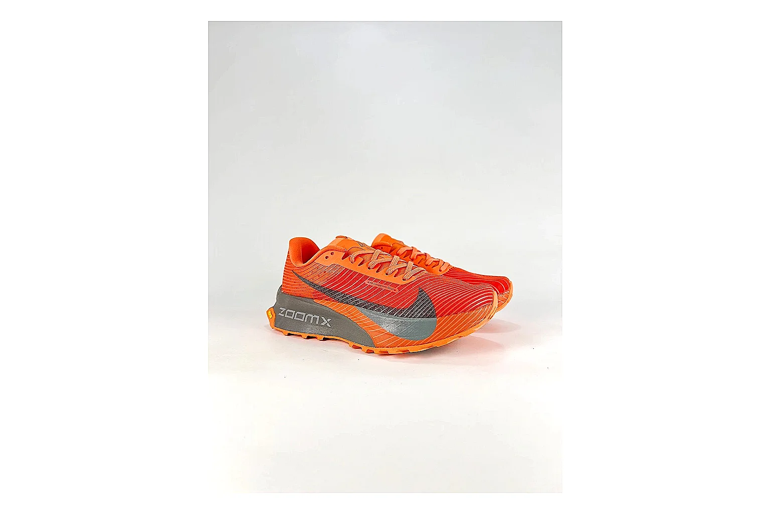 Nike ACG Ultra Orange Gray Sneakers QC photo reference showing orange gray outdoor sneakers with textile texture, side-profile shape, upper panel lines, and outsole detail thumbnail 5