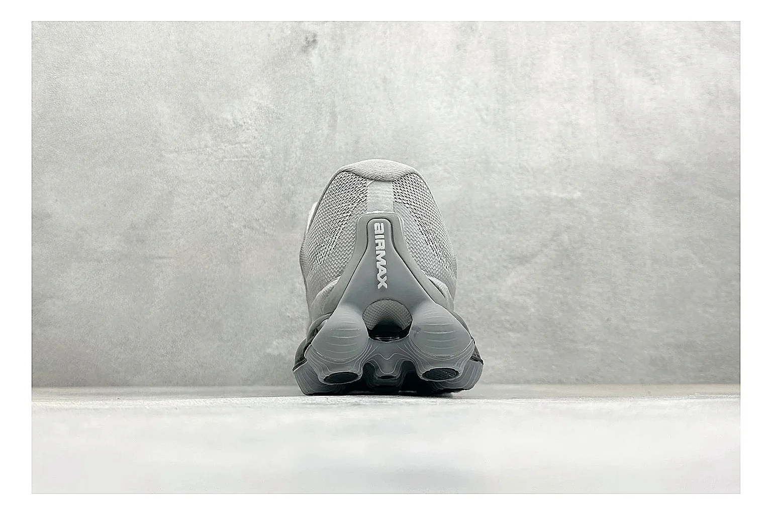 Nike Air Liquid Metal Silver QC reference image showing reflective silver upper, running-inspired panels, sculpted pod outsole, and glossy tech finish