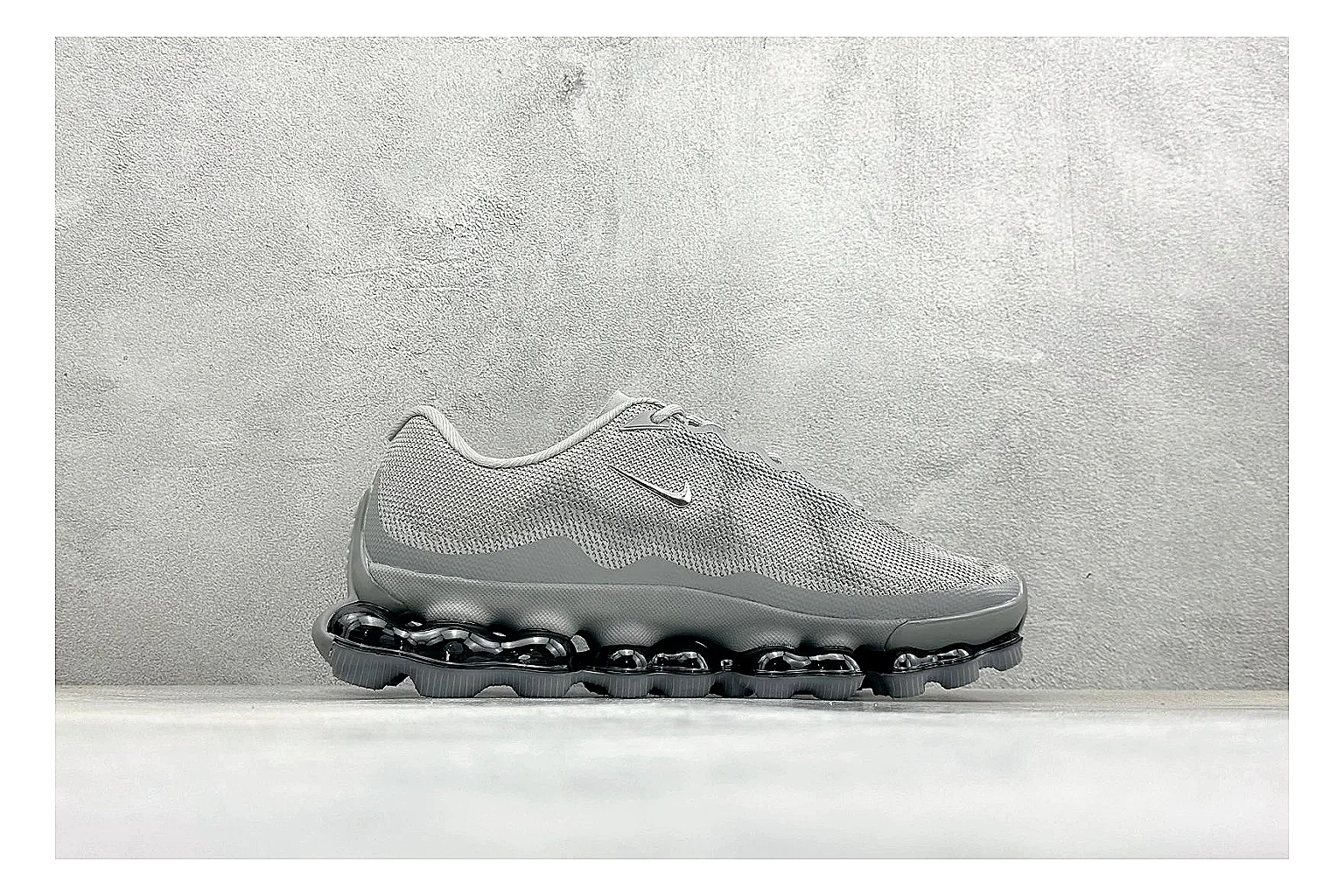 Nike Air Liquid Metal Silver QC reference image showing reflective silver upper, running-inspired panels, sculpted pod outsole, and glossy tech finish thumbnail 5