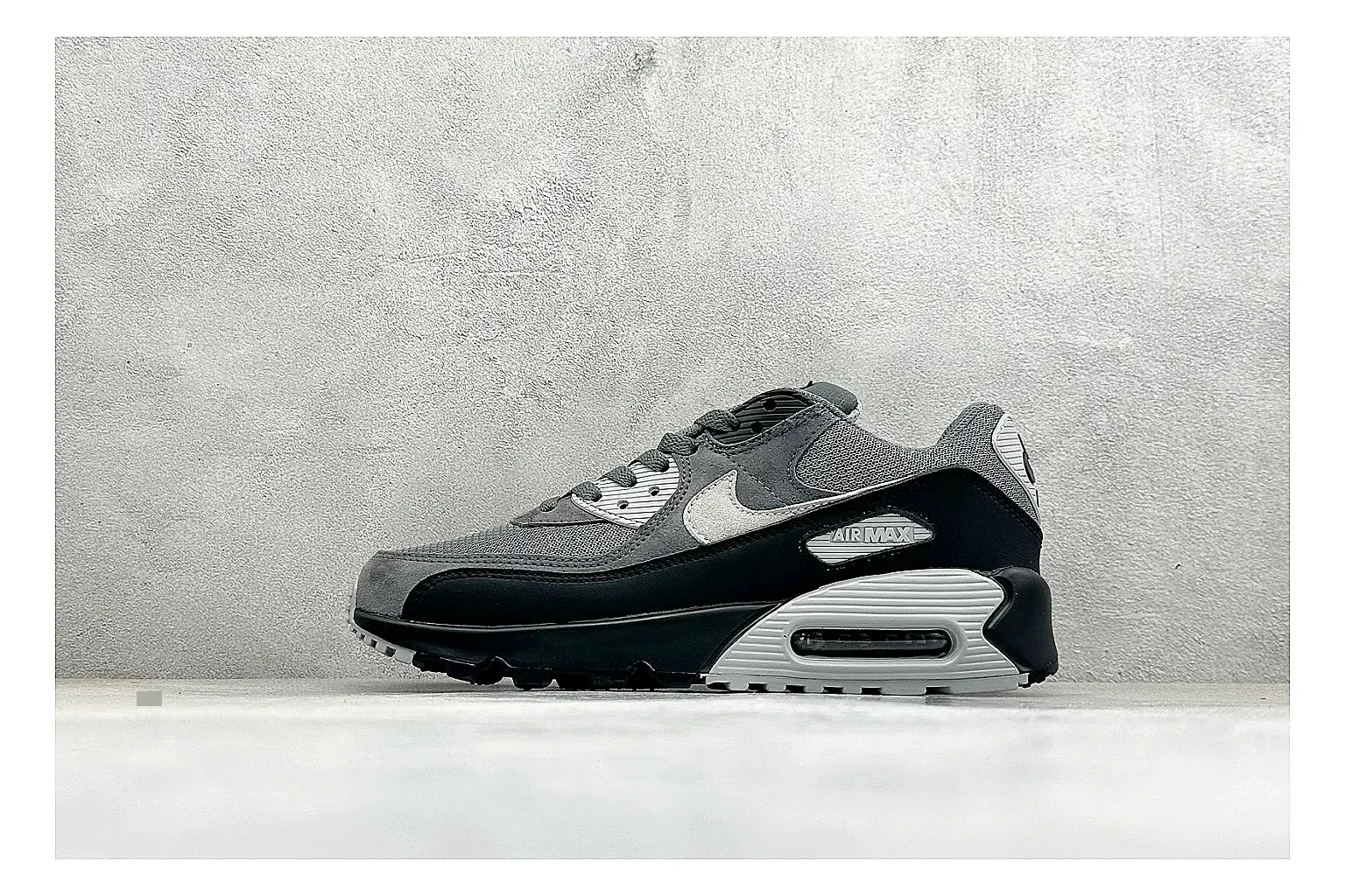 Nike Air Max 90 Grey Black QC reference photo showing grey and black layered upper, visible Air window, classic Air Max 90 panels, and sturdy retro sole