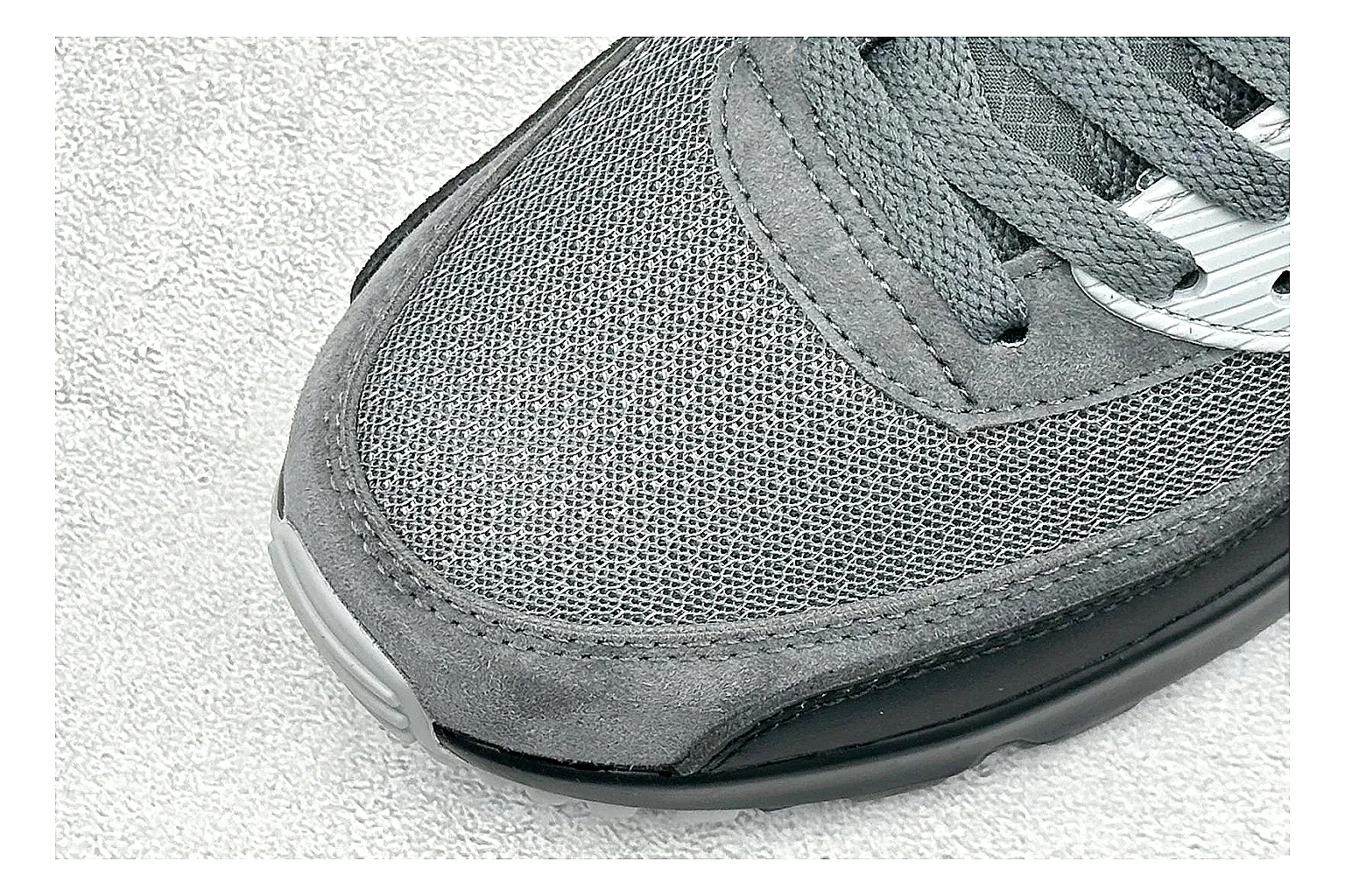 Nike Air Max 90 Grey Black QC reference photo showing grey and black layered upper, visible Air window, classic Air Max 90 panels, and sturdy retro sole thumbnail 4