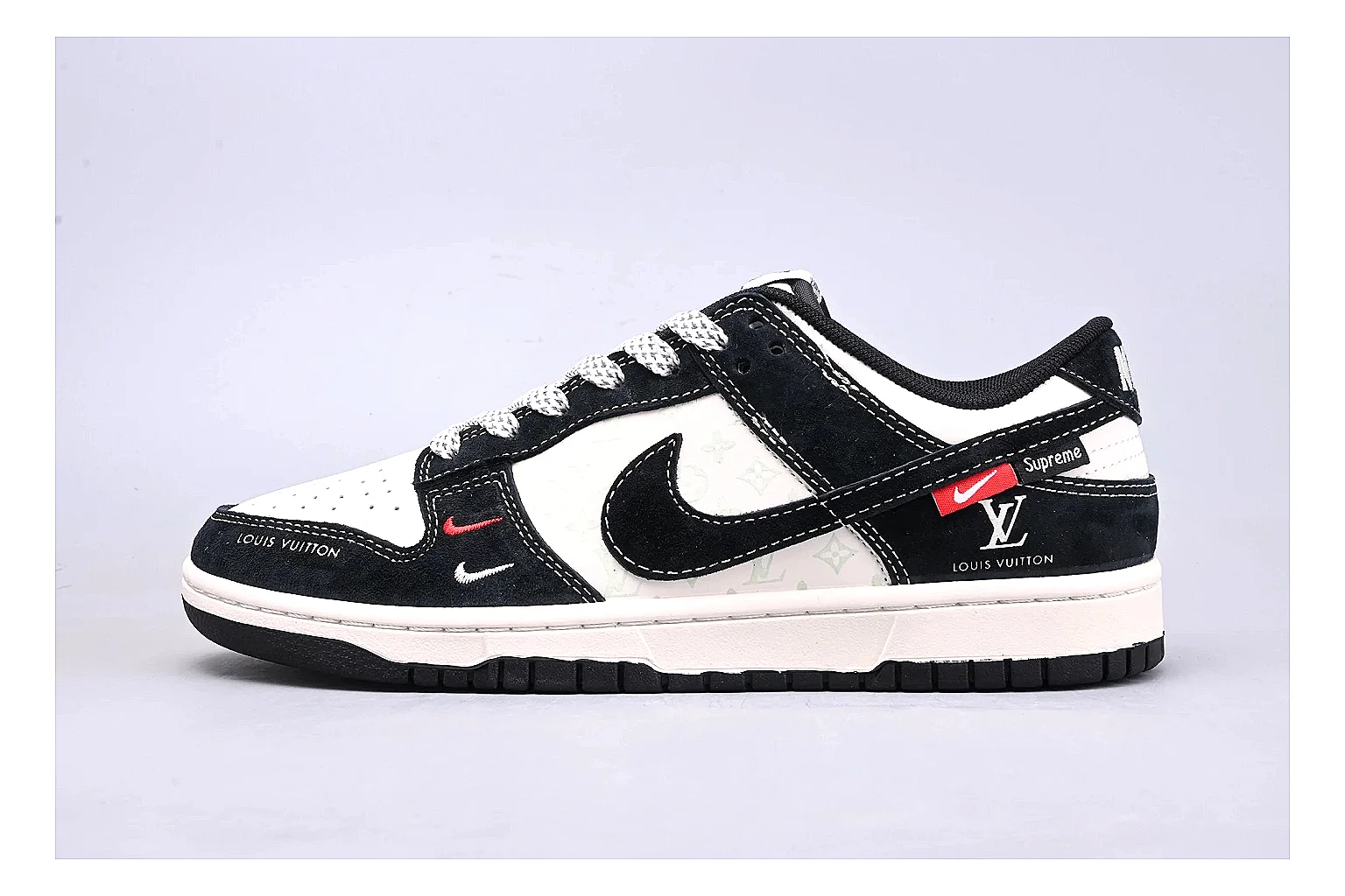 Nike Dunk Low Black White QC reference photo showing black and white leather panels, low Dunk silhouette, padded collar, and basketball-retro sole