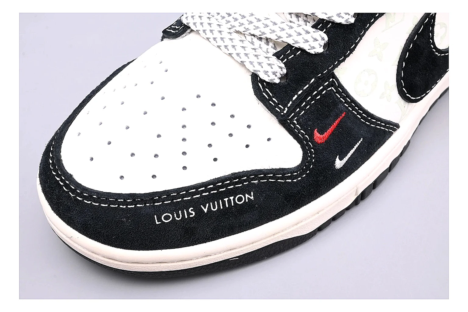 Nike Dunk Low Black White QC reference photo showing black and white leather panels, low Dunk silhouette, padded collar, and basketball-retro sole thumbnail 4