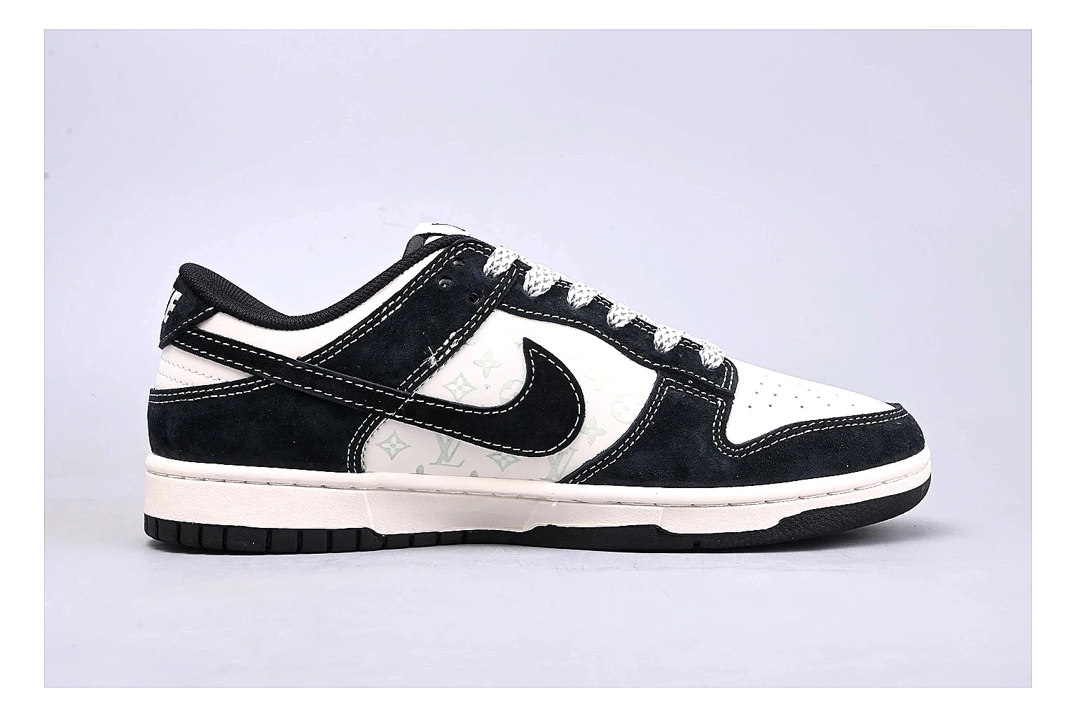 Nike Dunk Low Black White QC reference photo showing black and white leather panels, low Dunk silhouette, padded collar, and basketball-retro sole thumbnail 5