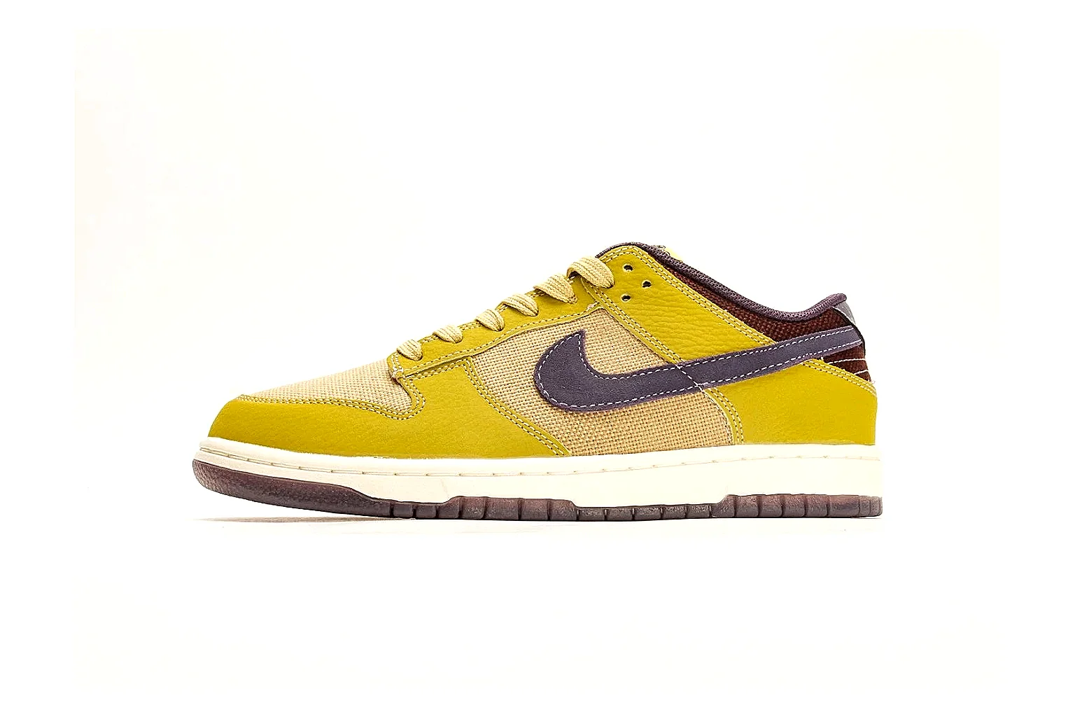 Nike Dunk Low Yellow Purple QC reference photo showing yellow and purple leather panels, dark Swoosh, heel overlay, cream midsole, and brown outsole