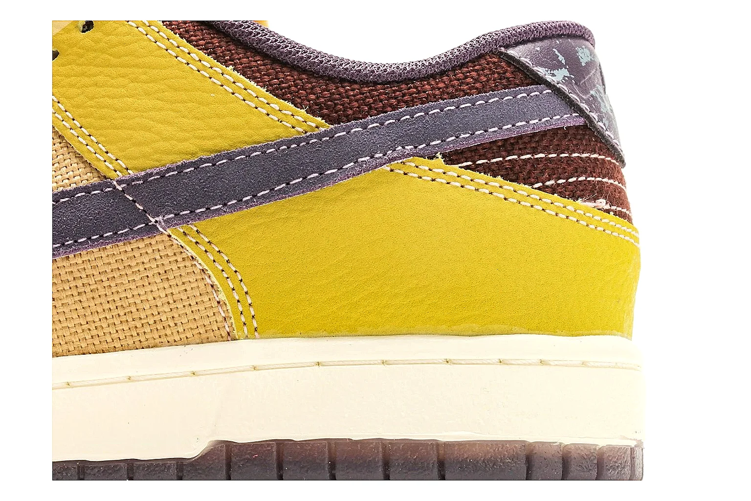 Nike Dunk Low Yellow Purple QC reference photo showing yellow and purple leather panels, dark Swoosh, heel overlay, cream midsole, and brown outsole thumbnail 4