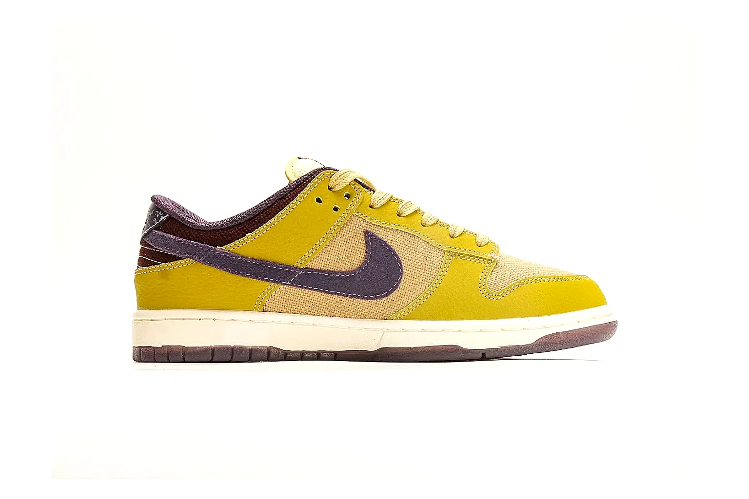 Nike Dunk Low Yellow Purple QC reference photo showing yellow and purple leather panels, dark Swoosh, heel overlay, cream midsole, and brown outsole thumbnail 5