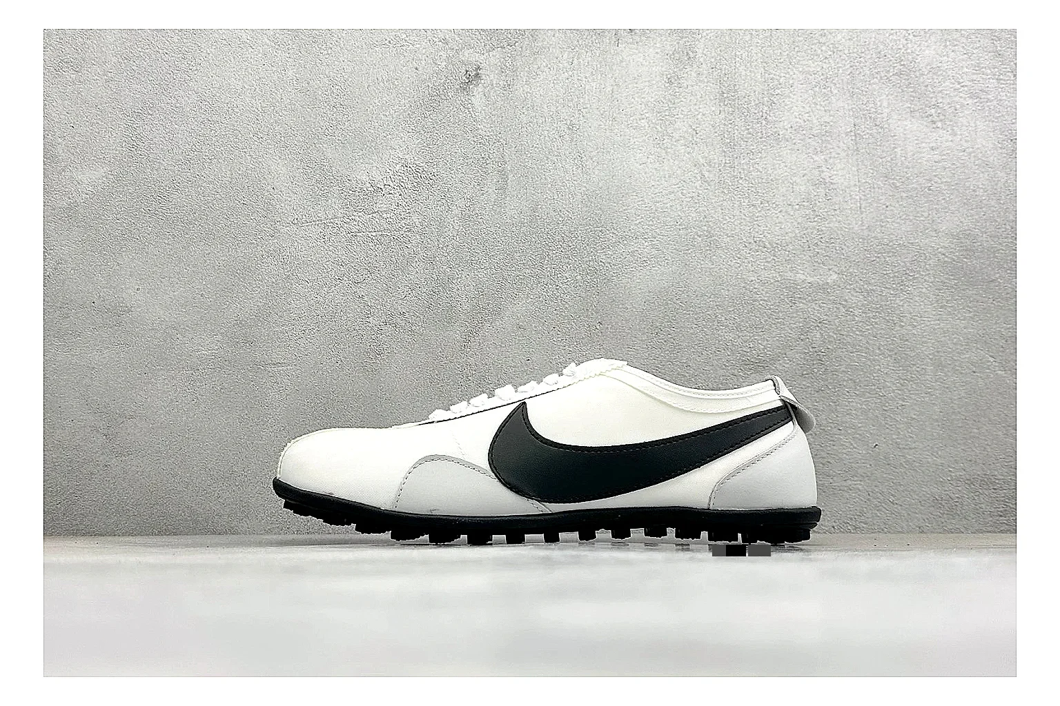 Nike Moon Shoe OG White Black QC reference image showing white upper, black Swoosh, slim retro runner shape, and waffle-style outsole