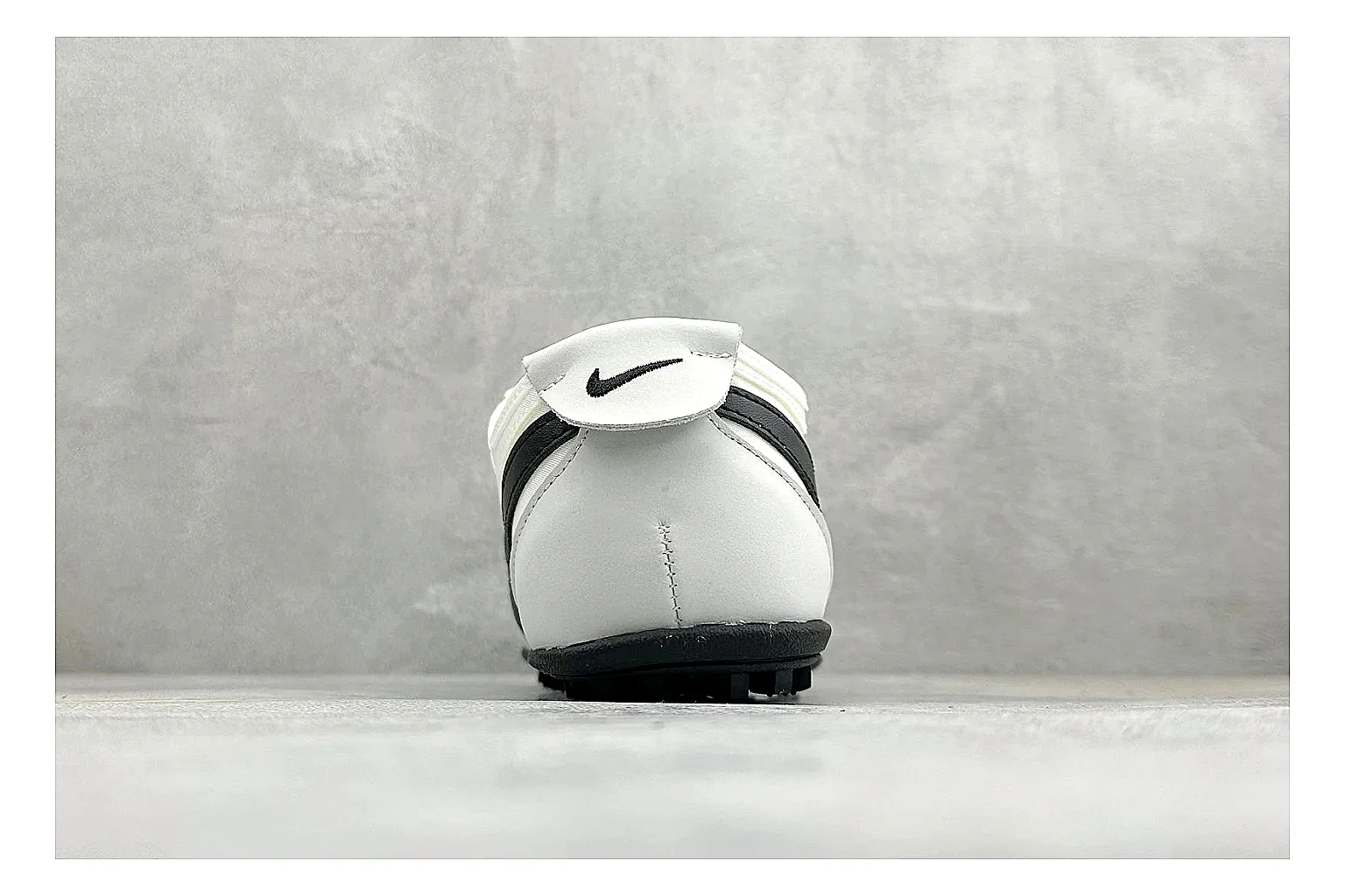 Nike Moon Shoe OG White Black QC reference image showing white upper, black Swoosh, slim retro runner shape, and waffle-style outsole
