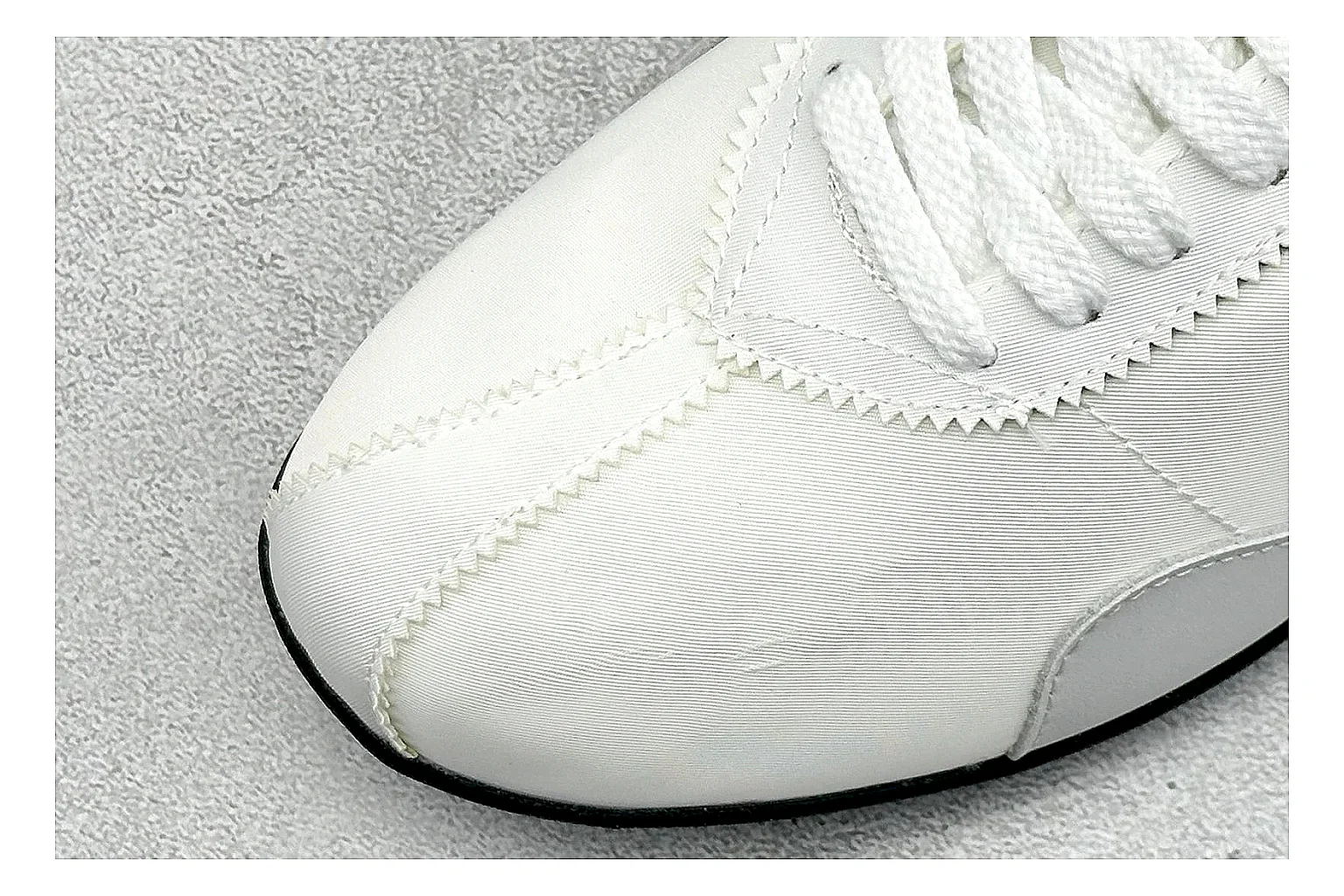 Nike Moon Shoe OG White Black QC reference image showing white upper, black Swoosh, slim retro runner shape, and waffle-style outsole thumbnail 4