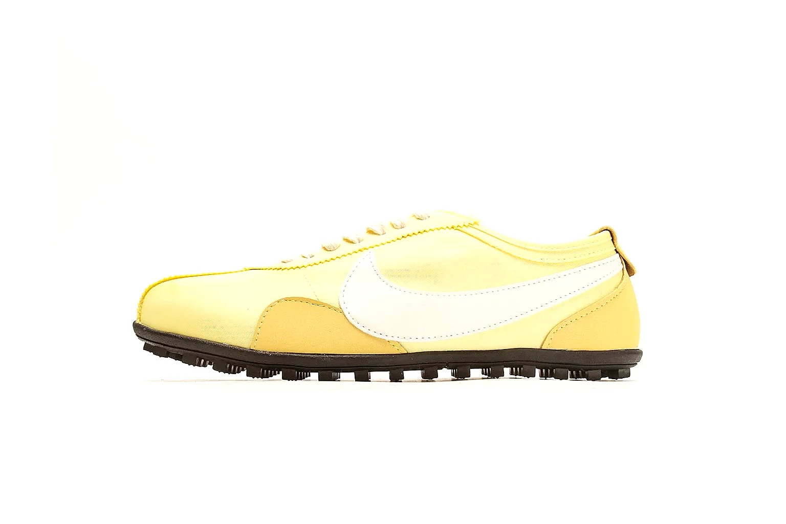Nike Moon Yellow Retro Runner QC reference photo showing yellow slim runner upper, white Swoosh, low retro profile, white midsole, and black waffle outsole