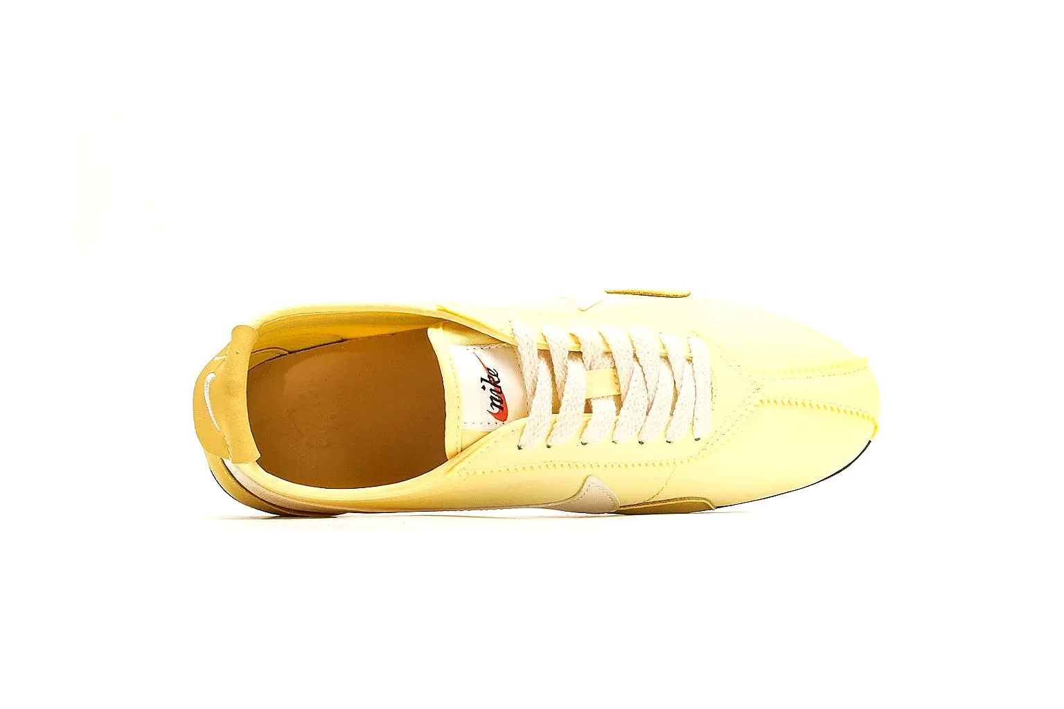 Nike Moon Yellow Retro Runner QC reference photo showing yellow slim runner upper, white Swoosh, low retro profile, white midsole, and black waffle outsole thumbnail 6