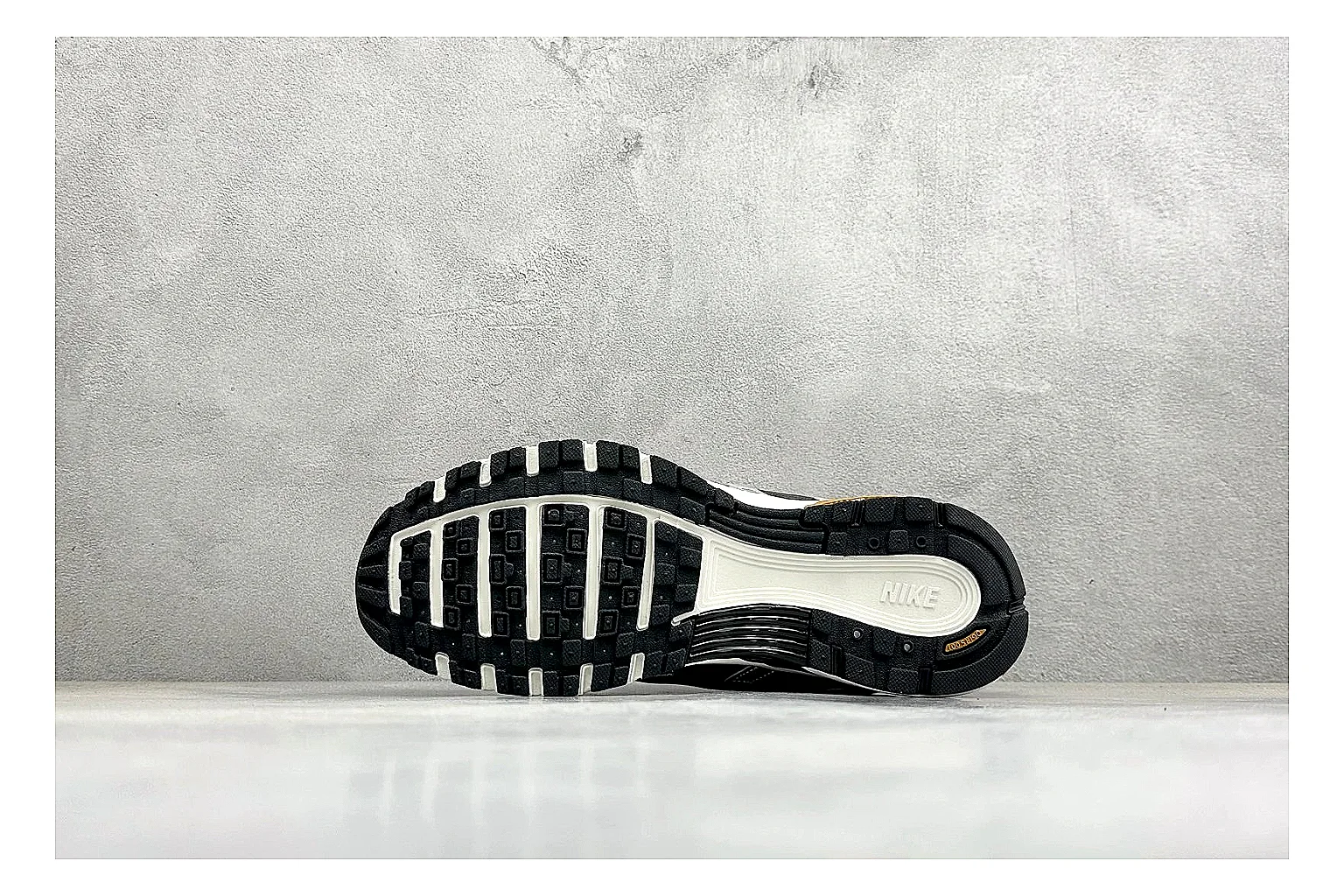 Nike P-6000 Black Orange QC reference photo showing black layered runner upper, orange accent hits, retro P-6000 paneling, and cushioned casual sole thumbnail 3