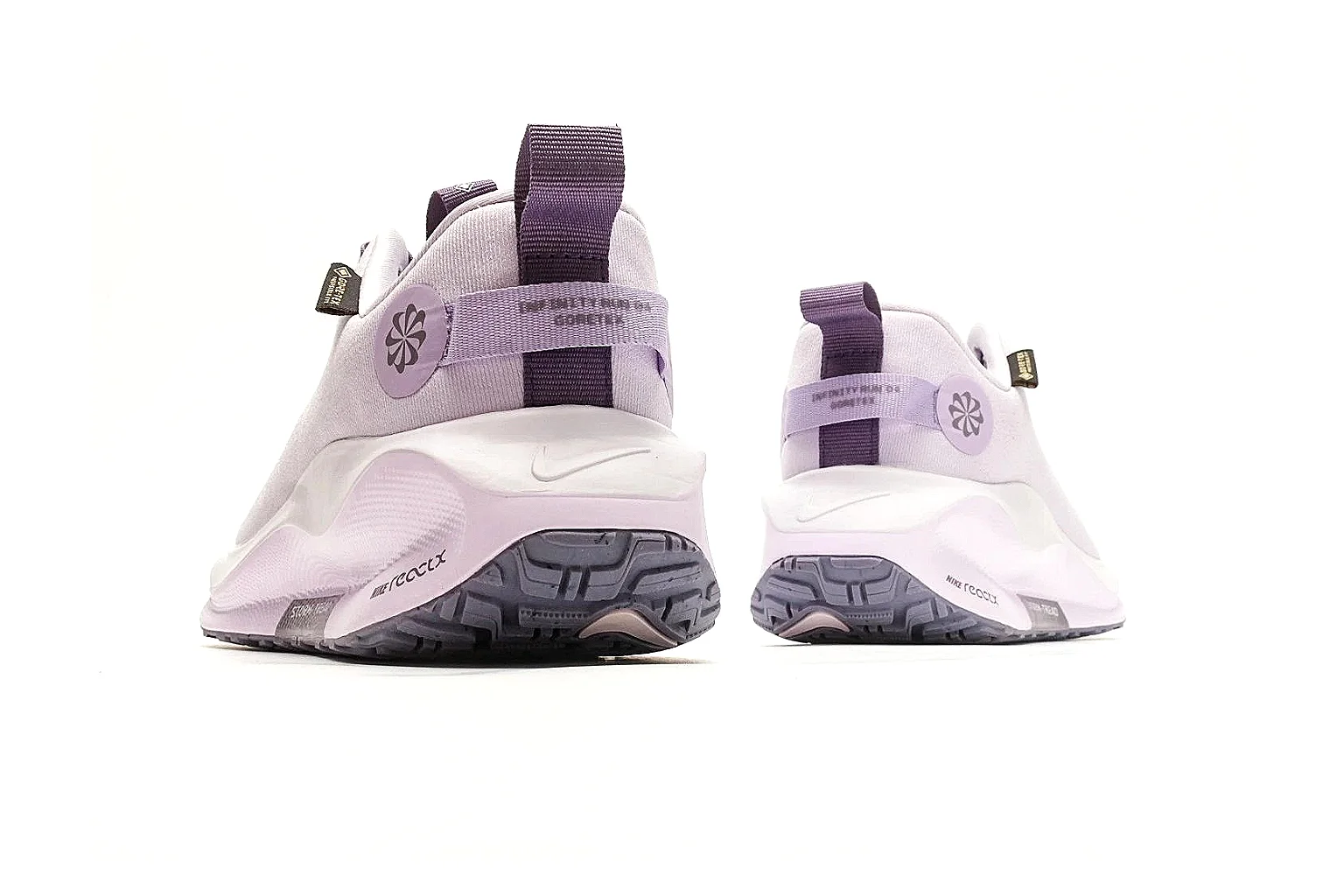 Nike ReactX GORE-TEX Lilac Sneakers QC reference photo showing lilac textile upper, small Swoosh, heel pull tabs, cushioned ReactX-style sole, and weather-ready low profile thumbnail 2