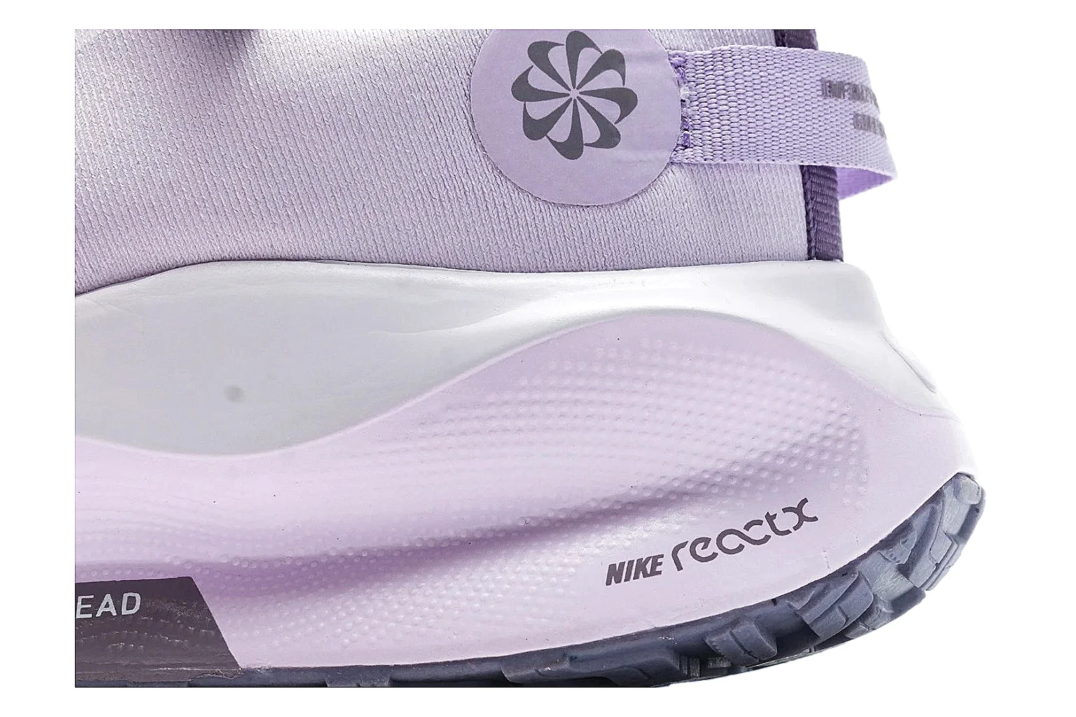 Nike ReactX GORE-TEX Lilac Sneakers QC reference photo showing lilac textile upper, small Swoosh, heel pull tabs, cushioned ReactX-style sole, and weather-ready low profile thumbnail 4
