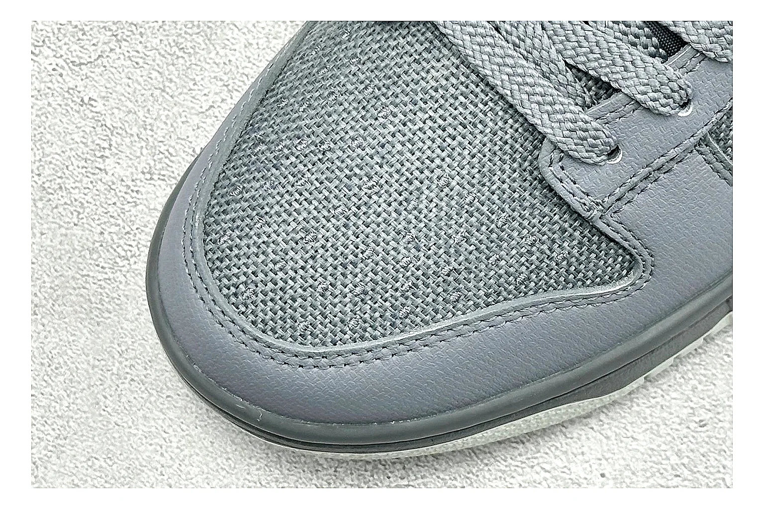 Nike SB Dunk Low Grey QC reference photo showing grey low-top skate upper, white Swoosh, padded collar, and classic Dunk sole thumbnail 4