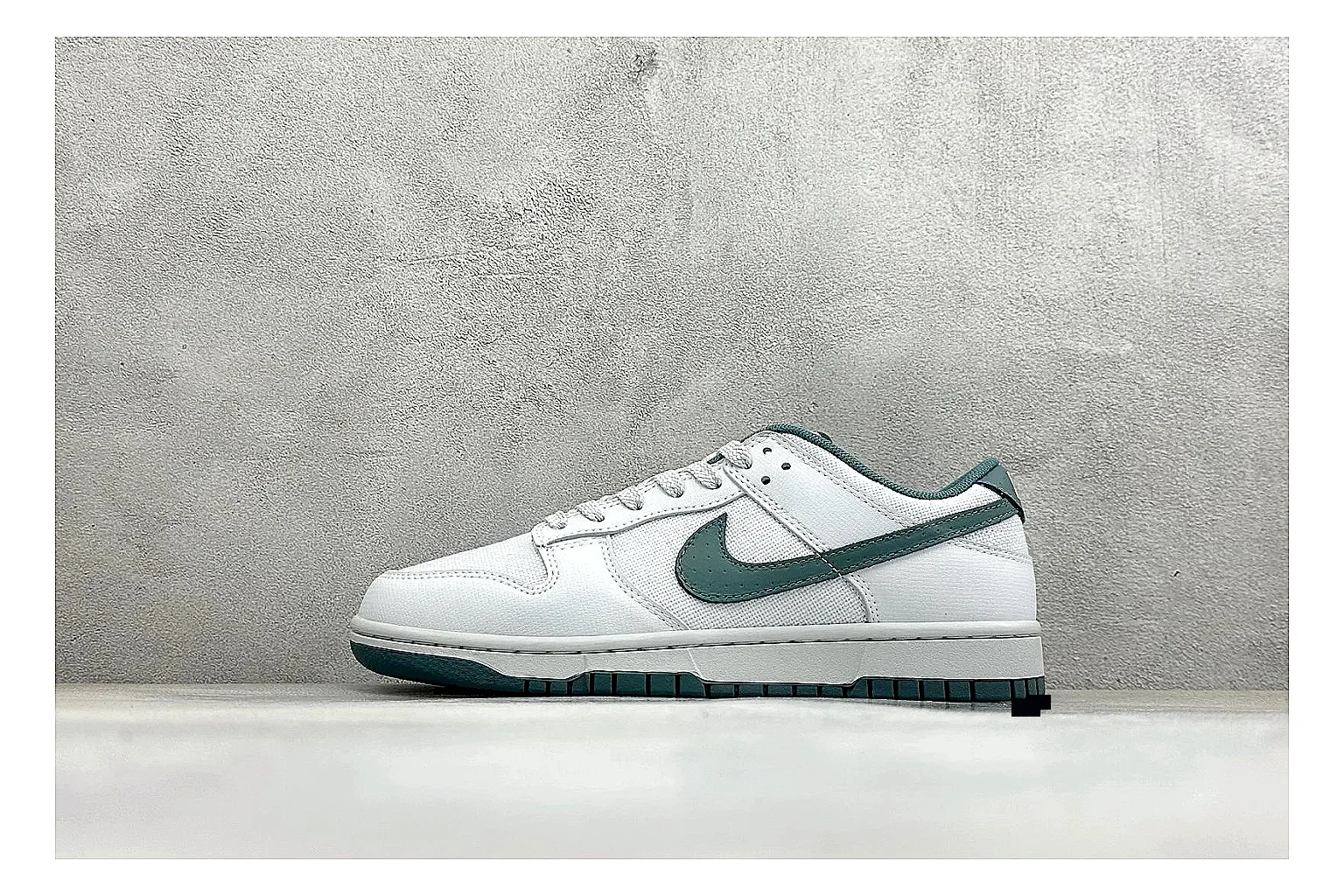 Nike SB Dunk Low White Green QC reference photo showing white low-top skate upper, green Swoosh, padded collar, and classic Dunk sole shape