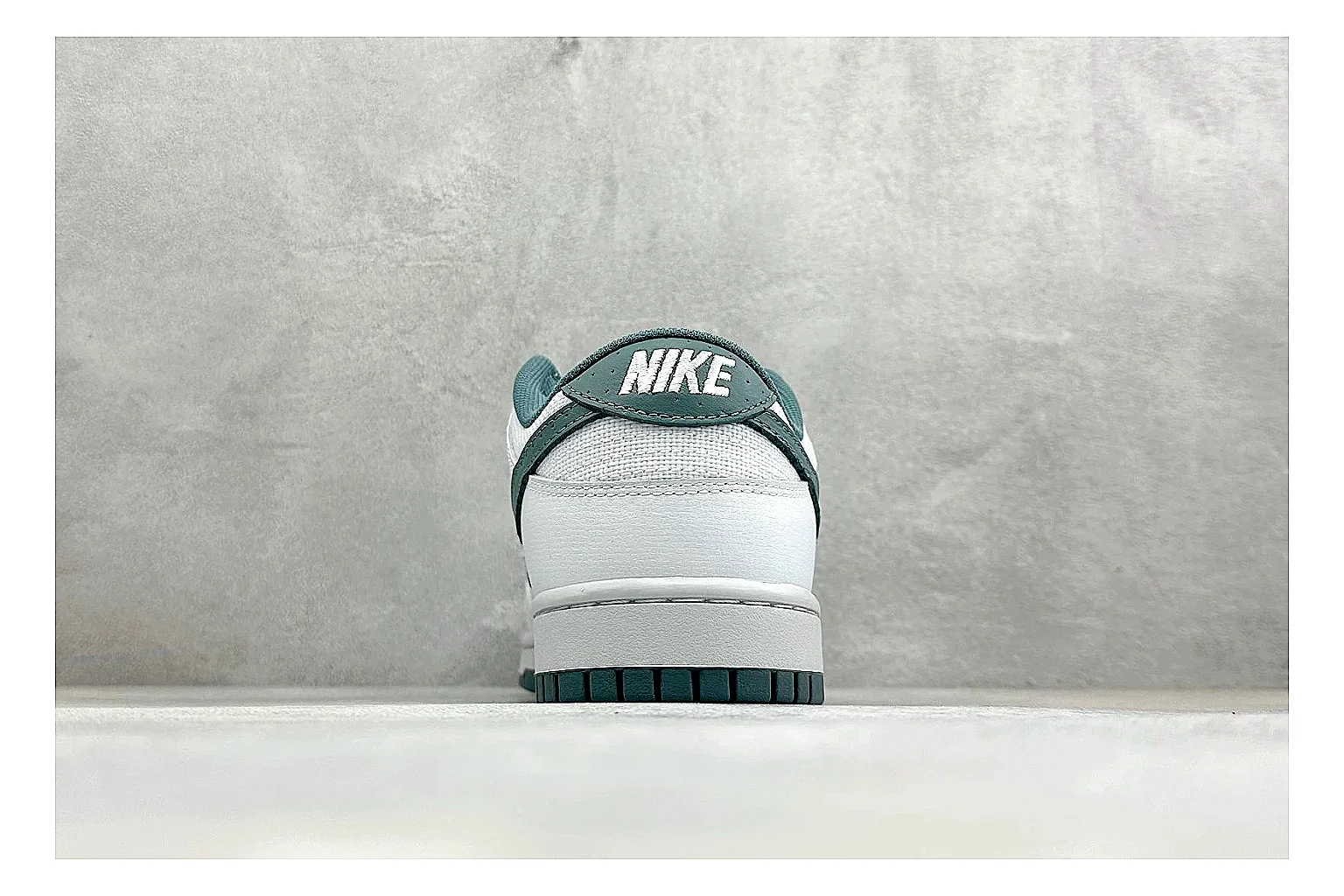 Nike SB Dunk Low White Green QC reference photo showing white low-top skate upper, green Swoosh, padded collar, and classic Dunk sole shape