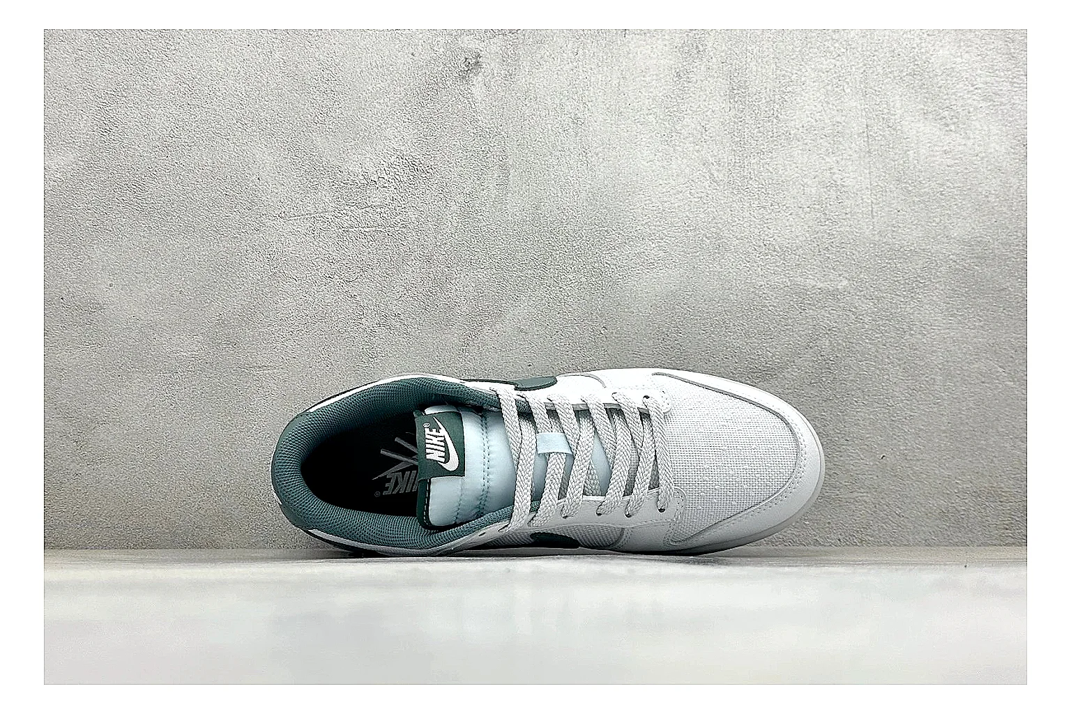 Nike SB Dunk Low White Green QC reference photo showing white low-top skate upper, green Swoosh, padded collar, and classic Dunk sole shape thumbnail 6